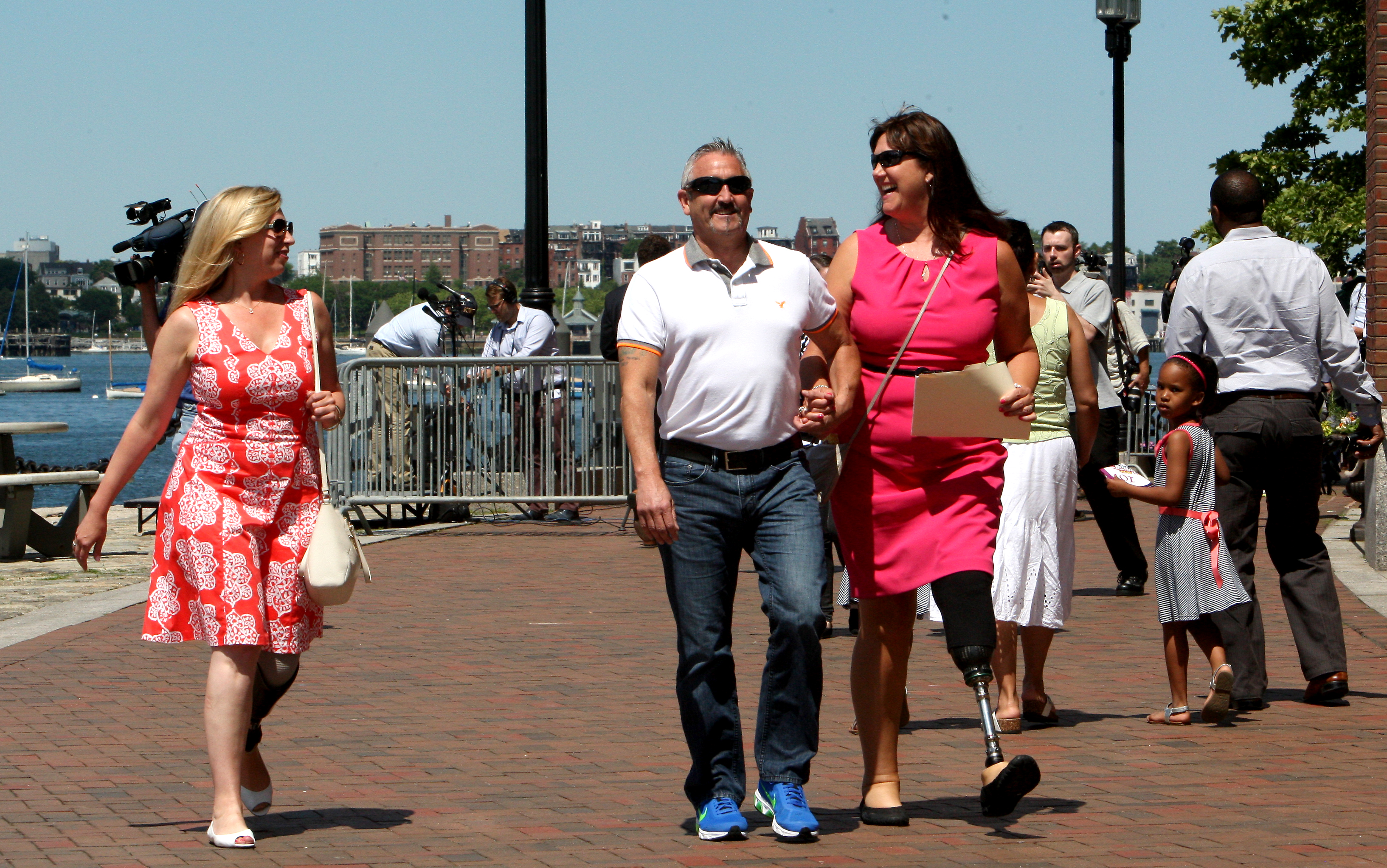 Marathon bombing survivors Heather Abbott (left) and Karen Rand McWatters (right) with her husband Kevin McWatters were outside the Moakley federal courthouse after the sentencing of Dzhokhar Tsarnaev.