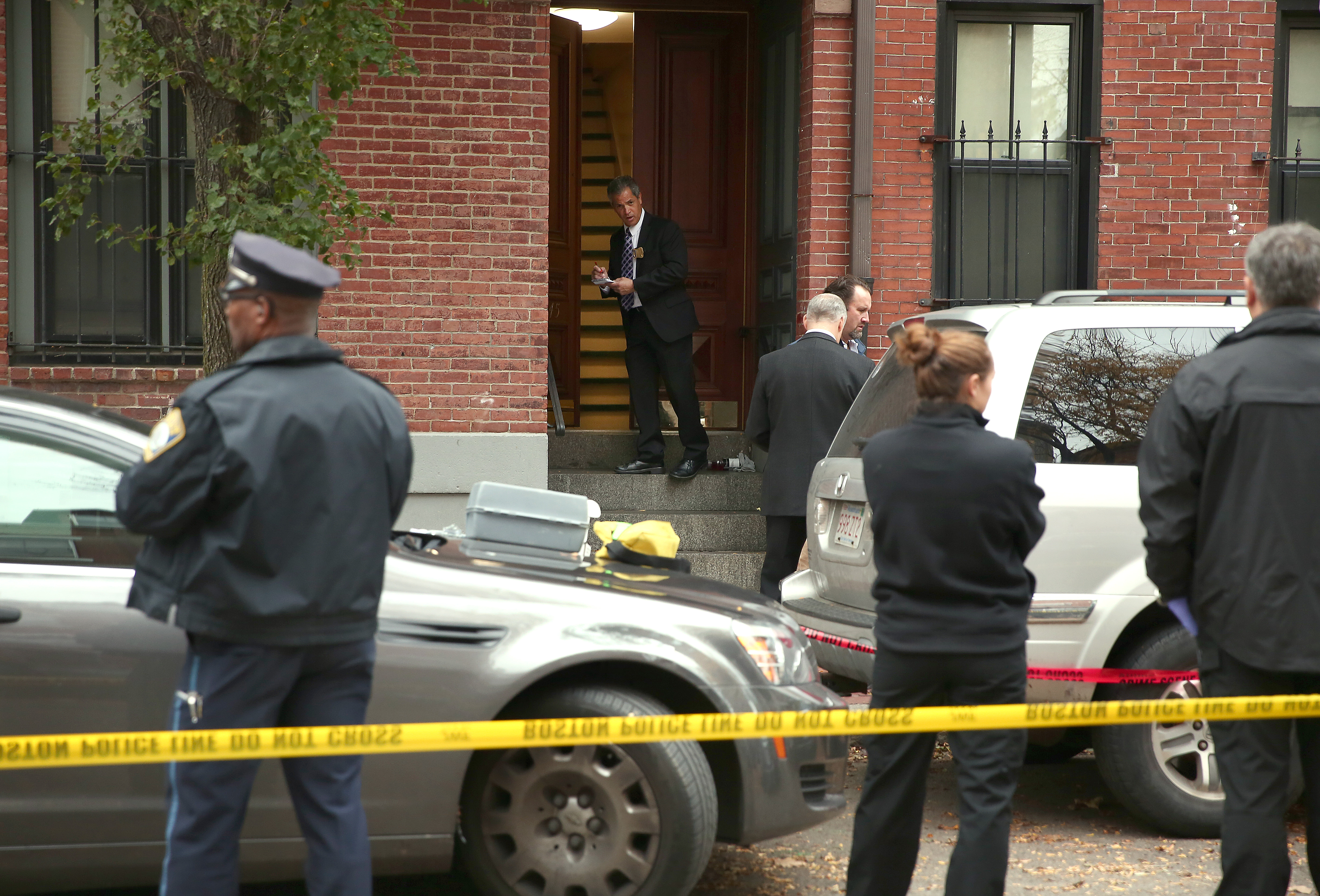 Boston police, with the cooperation of the district attorney’s office, gathered clues at the residence on Shawmut Avenue.
