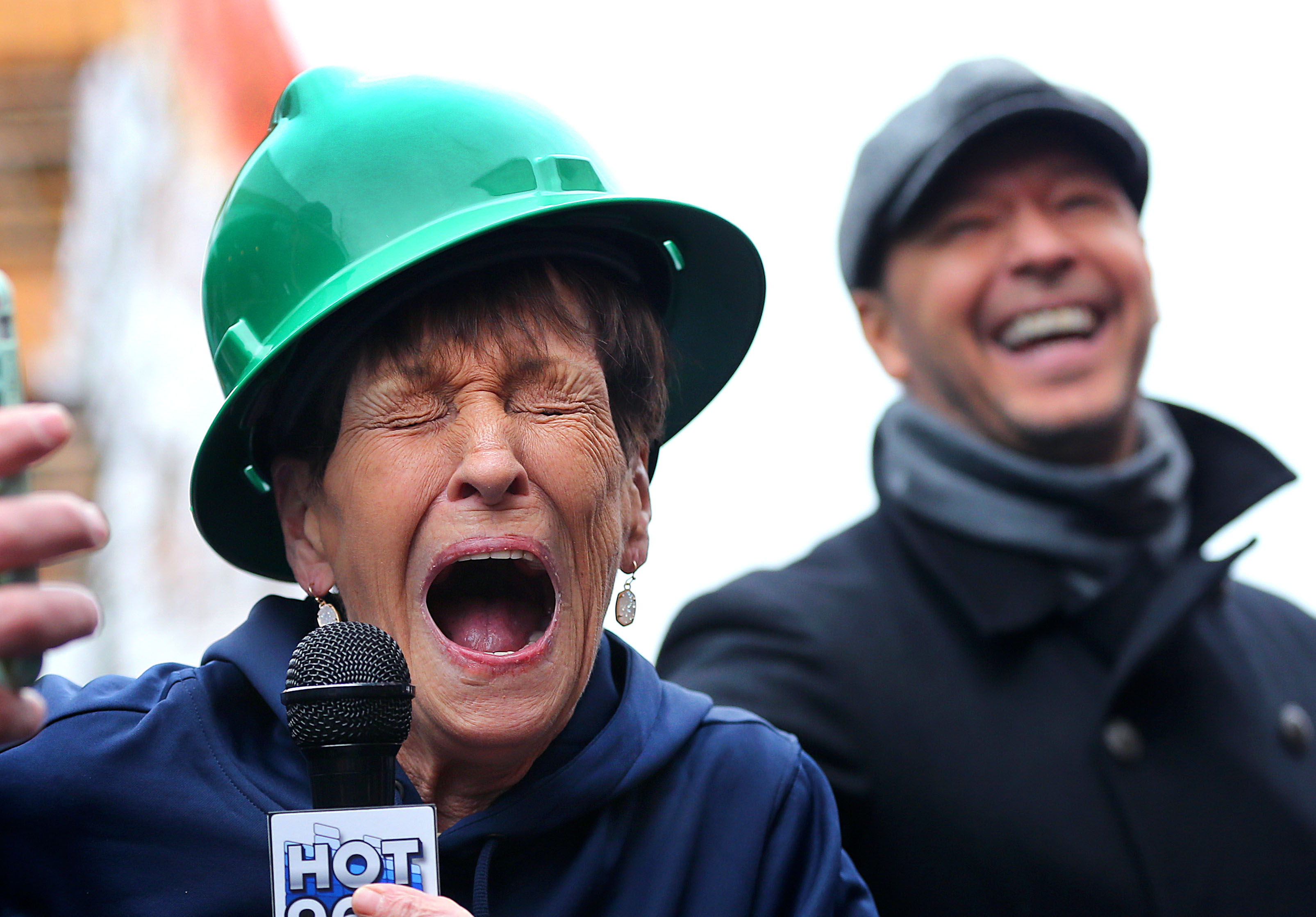 Alma and Donnie (background) got a laugh out of a story Alma told during the event in Dorchester.
