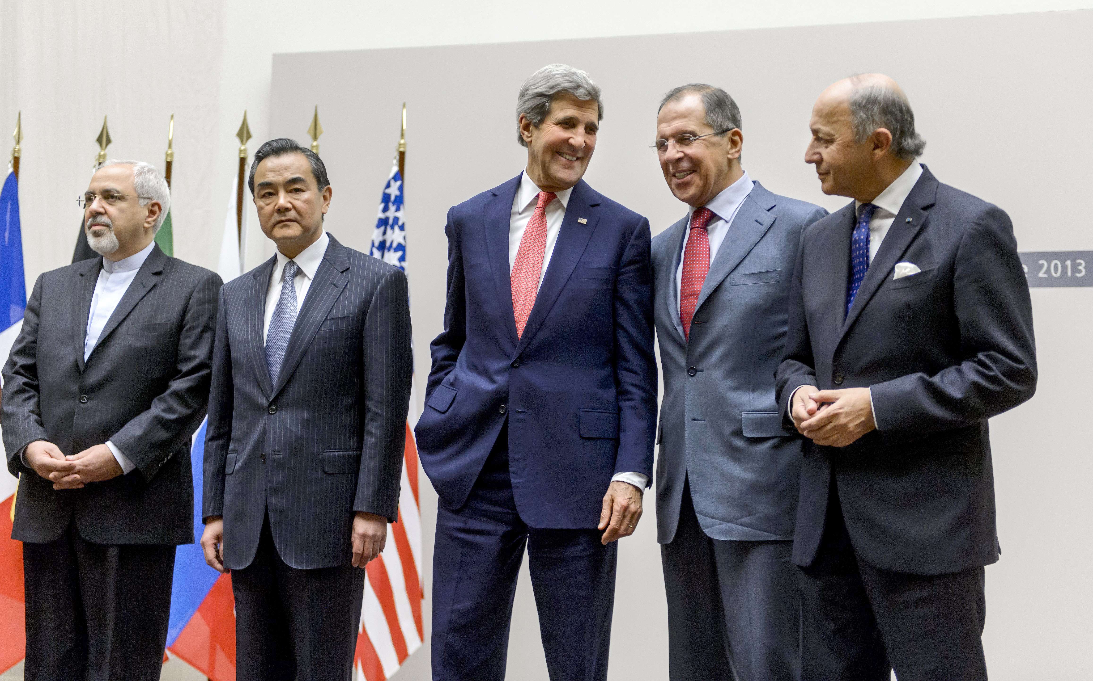 In November, Kerry stood with foreign ministers from Iran, China, Russia, and France in Geneva.