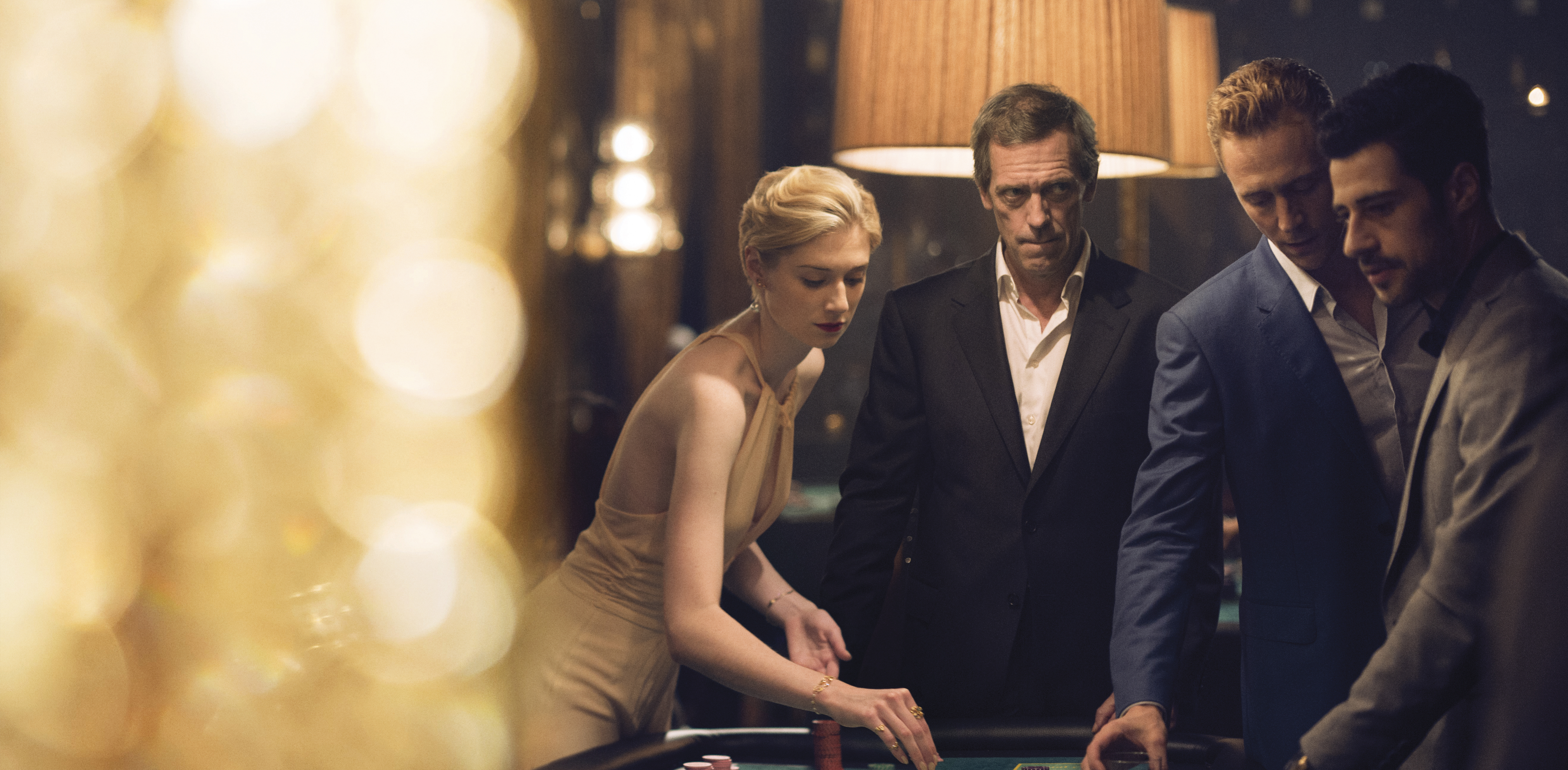 From left: Elizabeth Debicki, Hugh Laurie, Tom Hiddleston, and David Avery in “The Night Manager.”