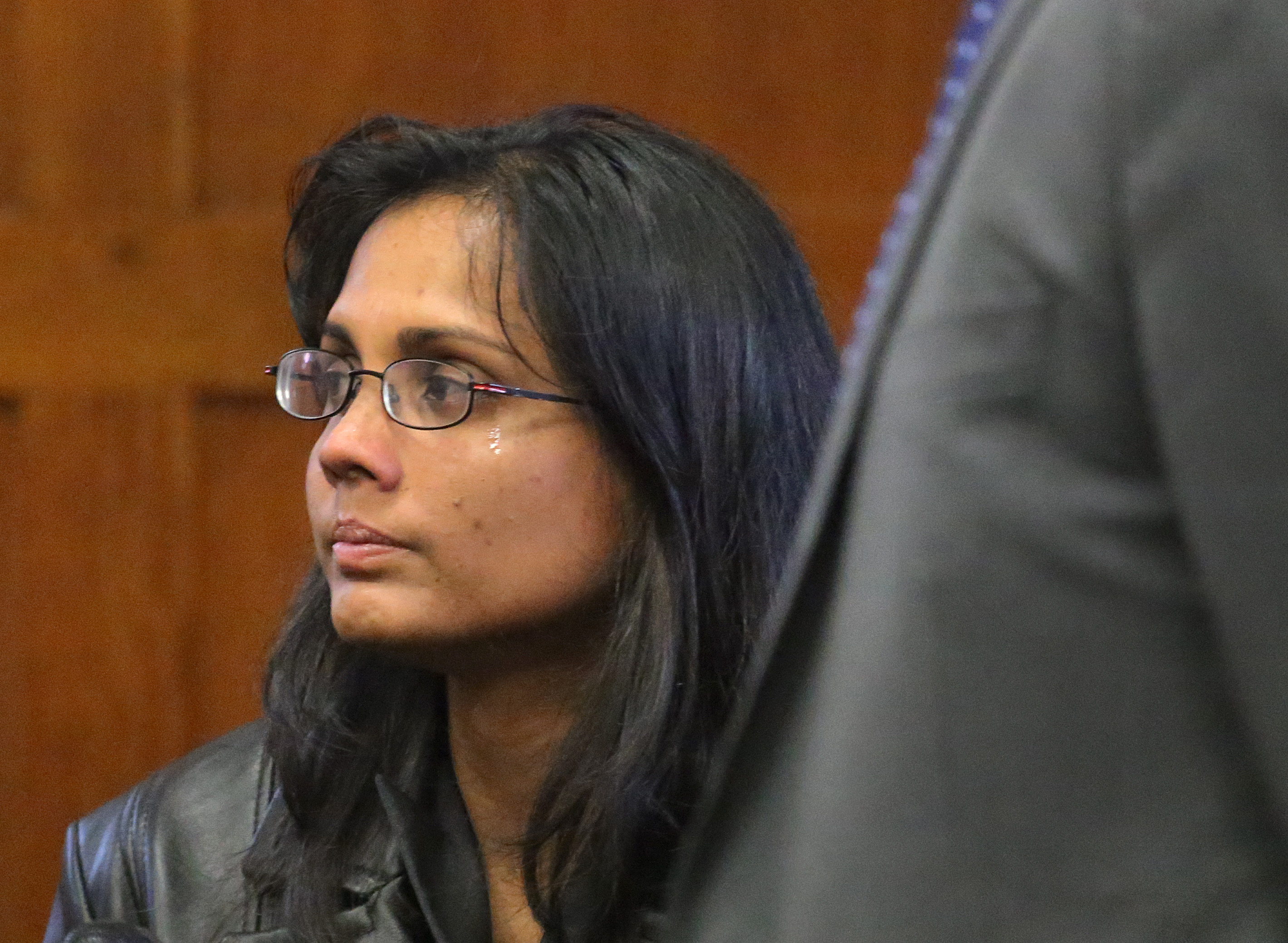 A tear ran down Annie Dookhan’s cheek during the court hearing.