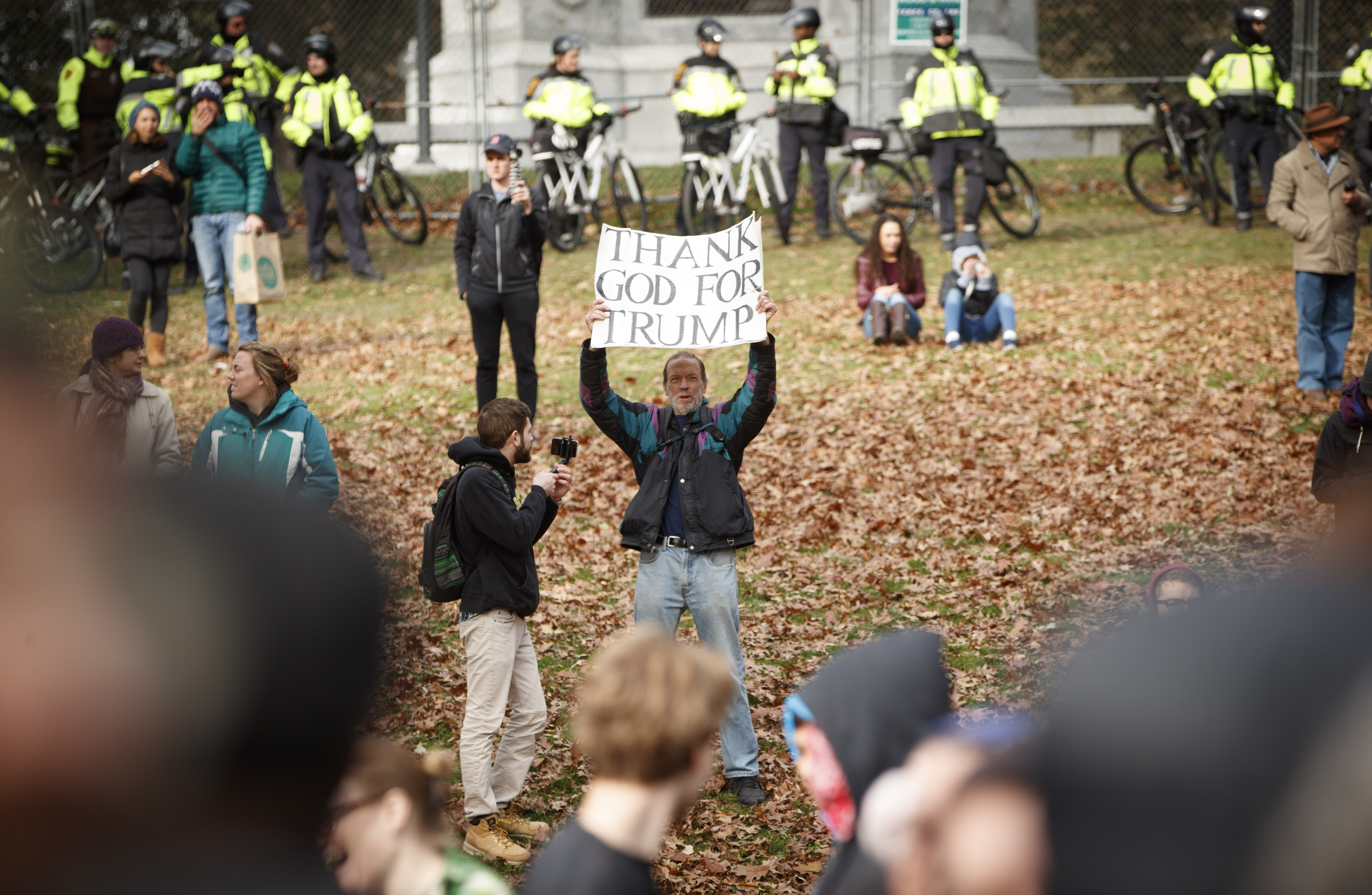 A man held a pro-Trump sign on the Common.