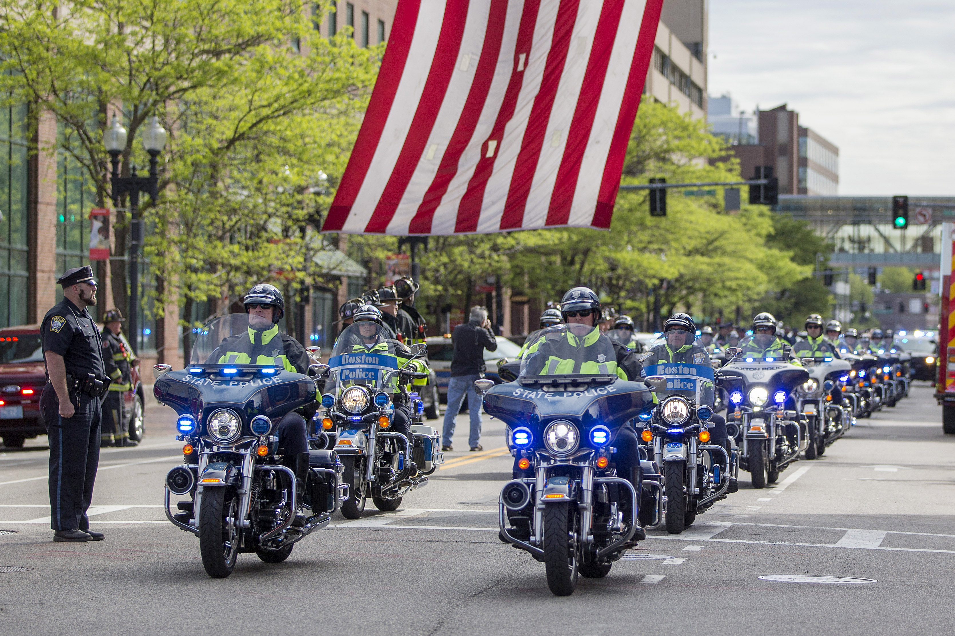 Police escorted the body of Officer Ronald Tarentino.