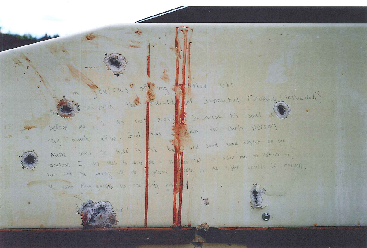 These photographs were taken inside the private boat that Dzhokhar A. Tsarnaev was hiding in before he was captured by police in the backyard of a Watertown home on April 19, 2013.