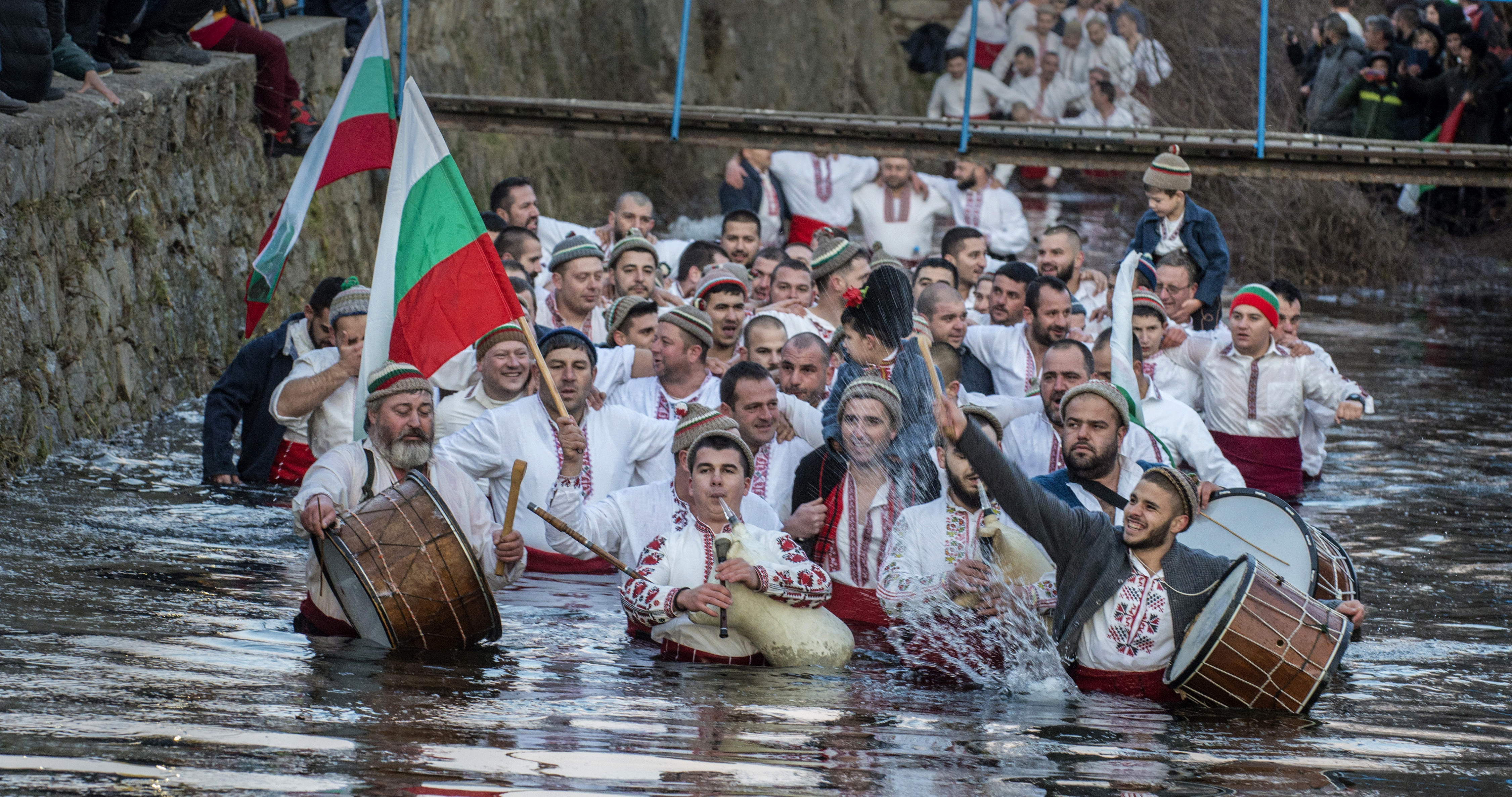 Bulgarians made their way into the icy waters of the Tundzha river during a ceremony in Kalofer, Bulgaria.