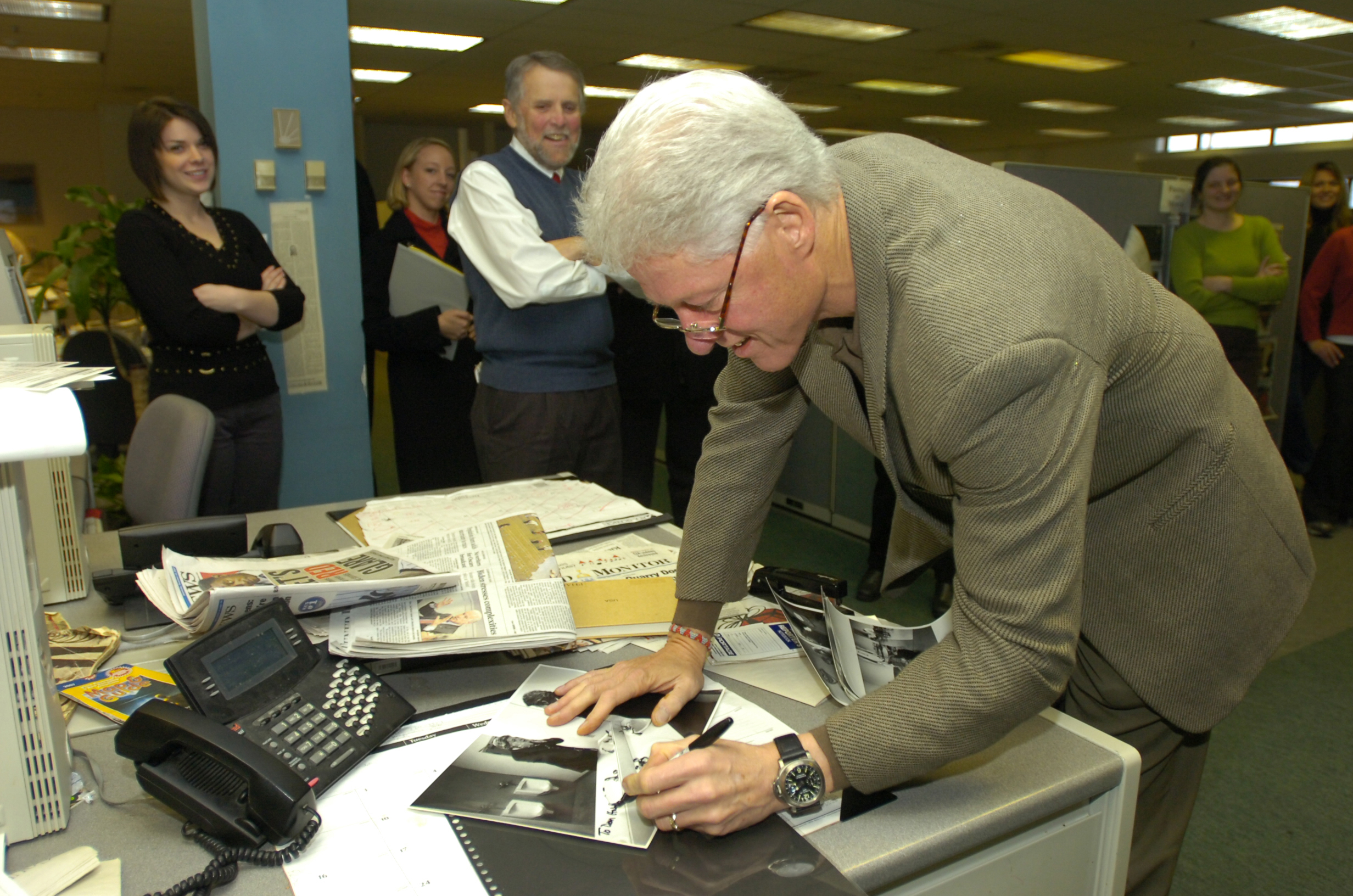 Former President Bill Clinton signed the iconic photo at the Concord Monitor in 2007.