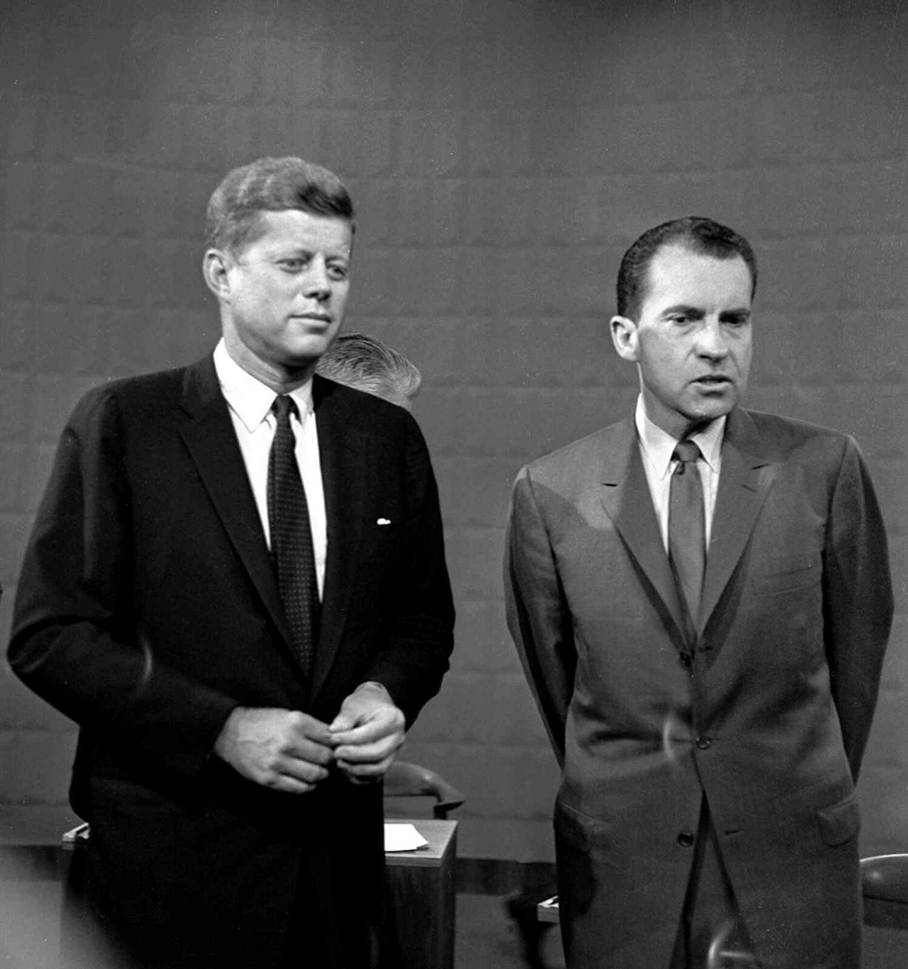 John Kennedy and Richard Nixon are seen on Sept. 26,1960, following their debate at a Chicago television studio.