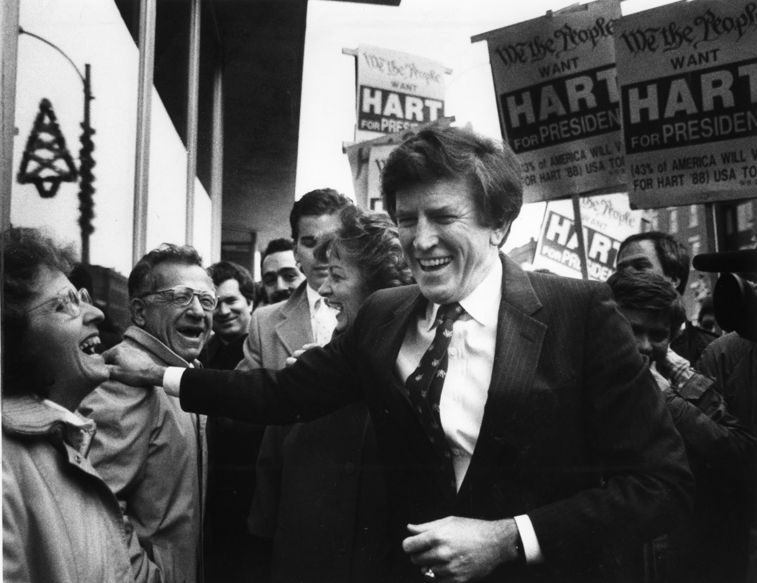 Gary Hart shared a laugh with voter while walking through downtown Concord, N.H., in December 1987.