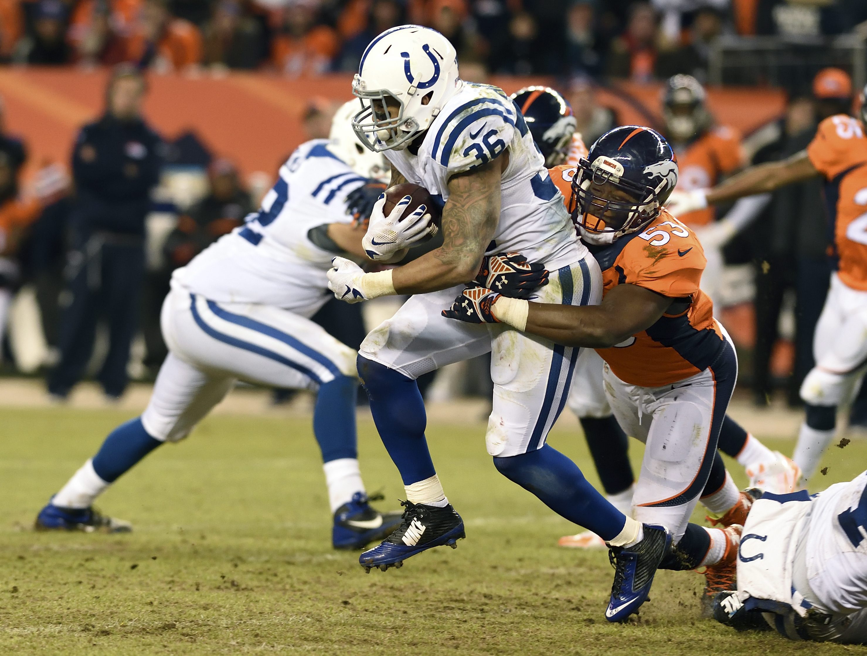 Daniel Herron had 63 yards and a touchdown against the Broncos in the divisional round.