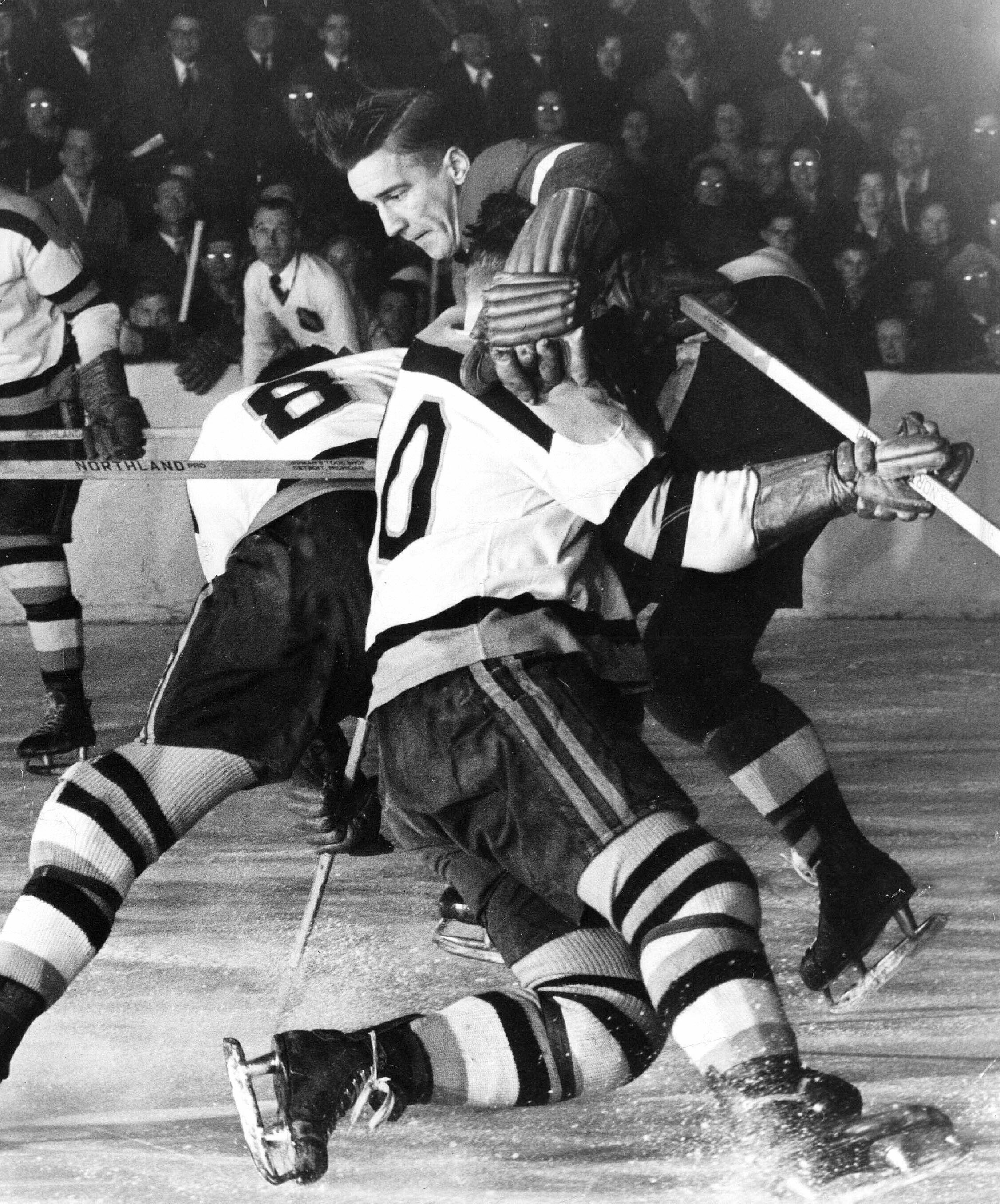 Ted Lindsay was tough enough to take on two Bruins at a time.
