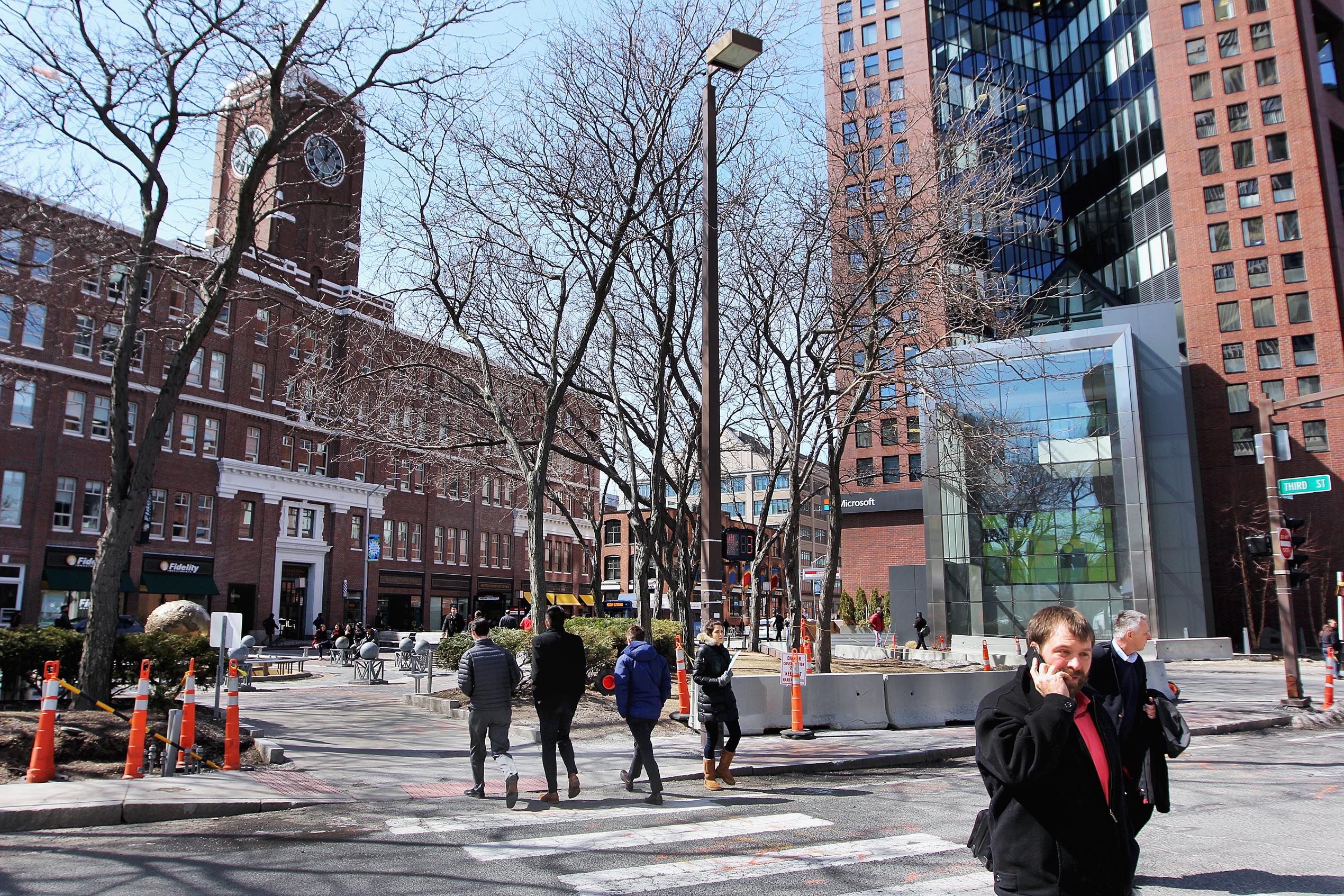 The university envisions a bustling business district, reminiscent of Kendall Square (above), at the site.