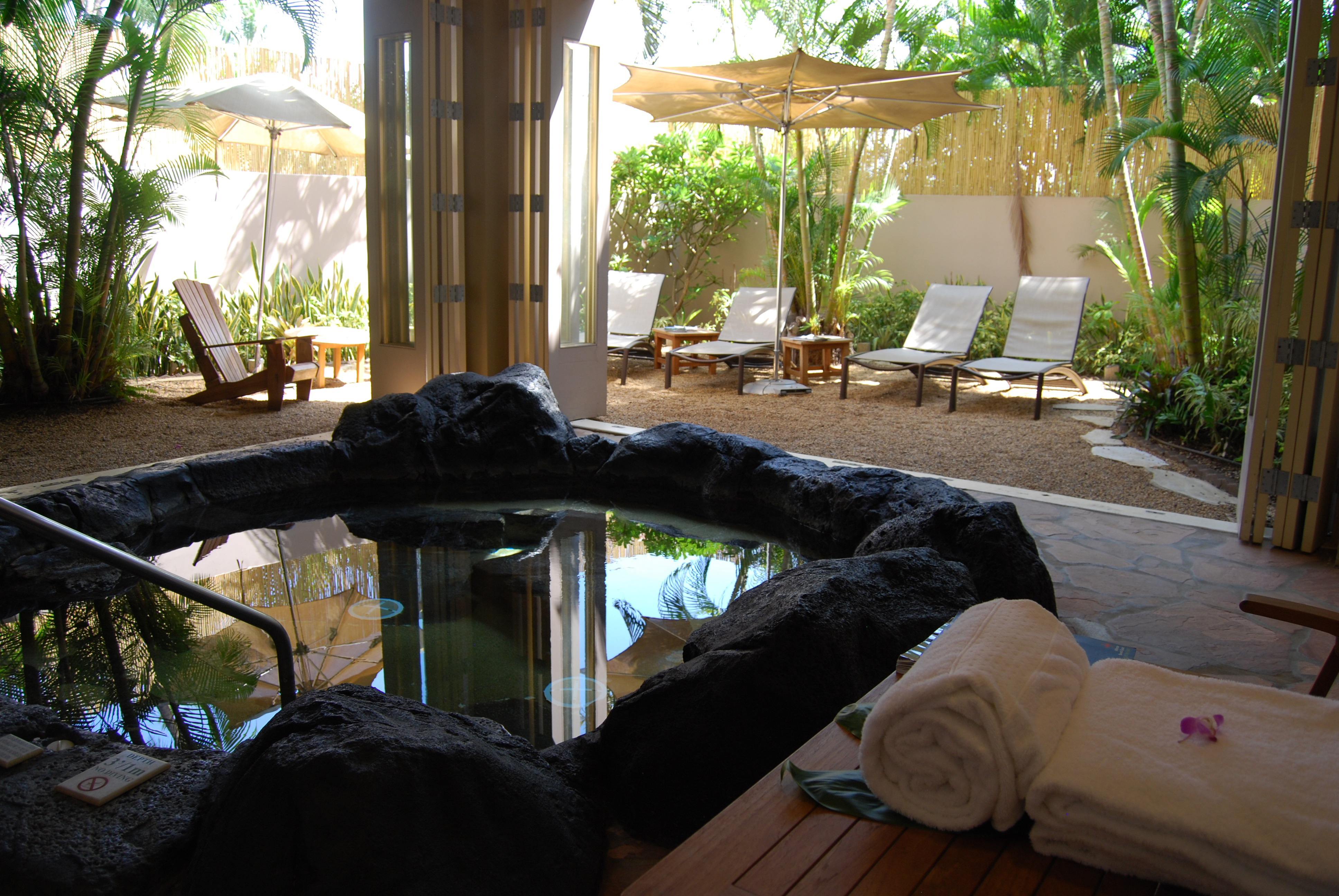 A private lounge and lava whirlpool provide a restful retreat for visitors at the Kohala Spa, which is located at the edge of the Hilton Waikoloa Village resort