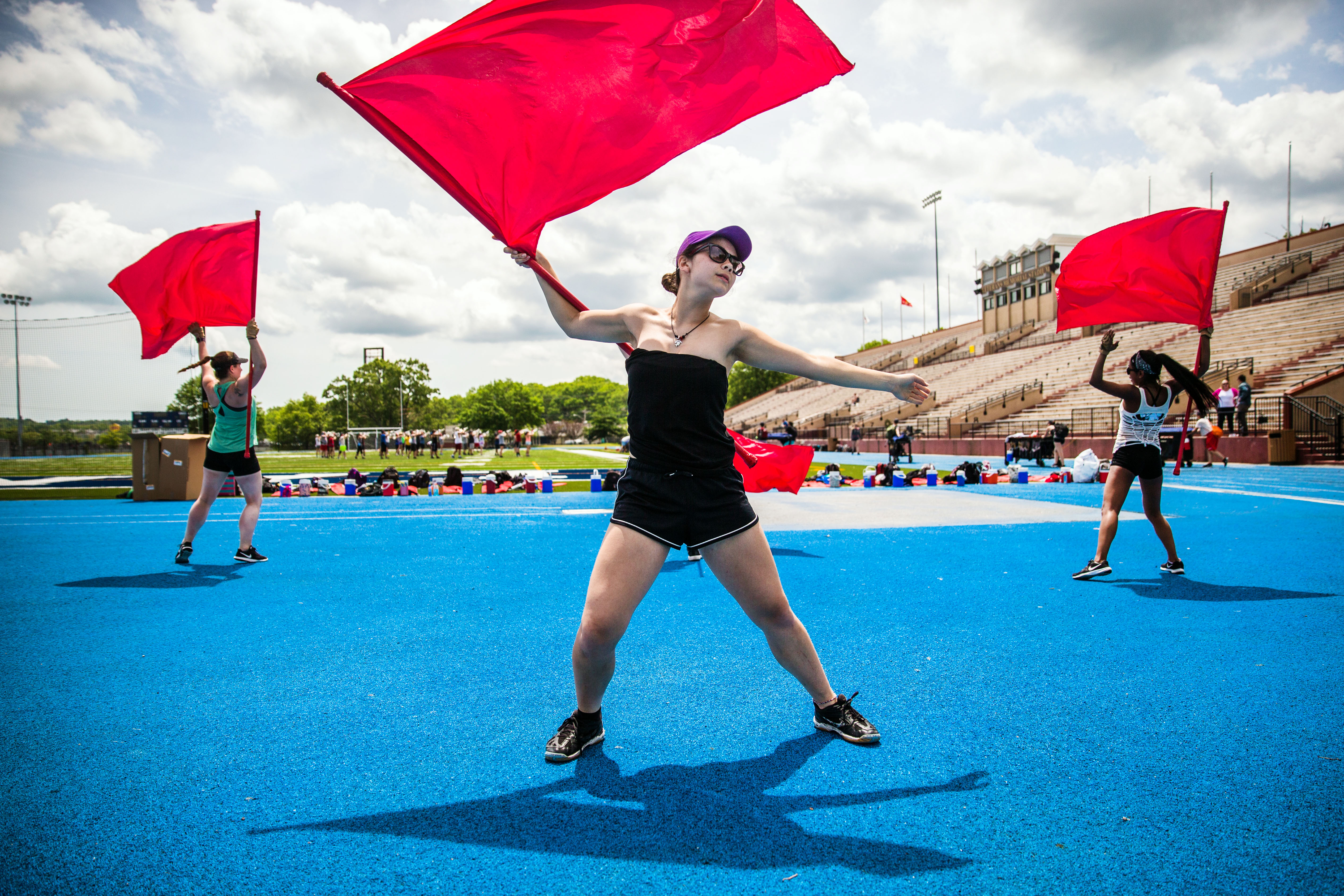 Mia Wong practiced a routine with other Spartan members.