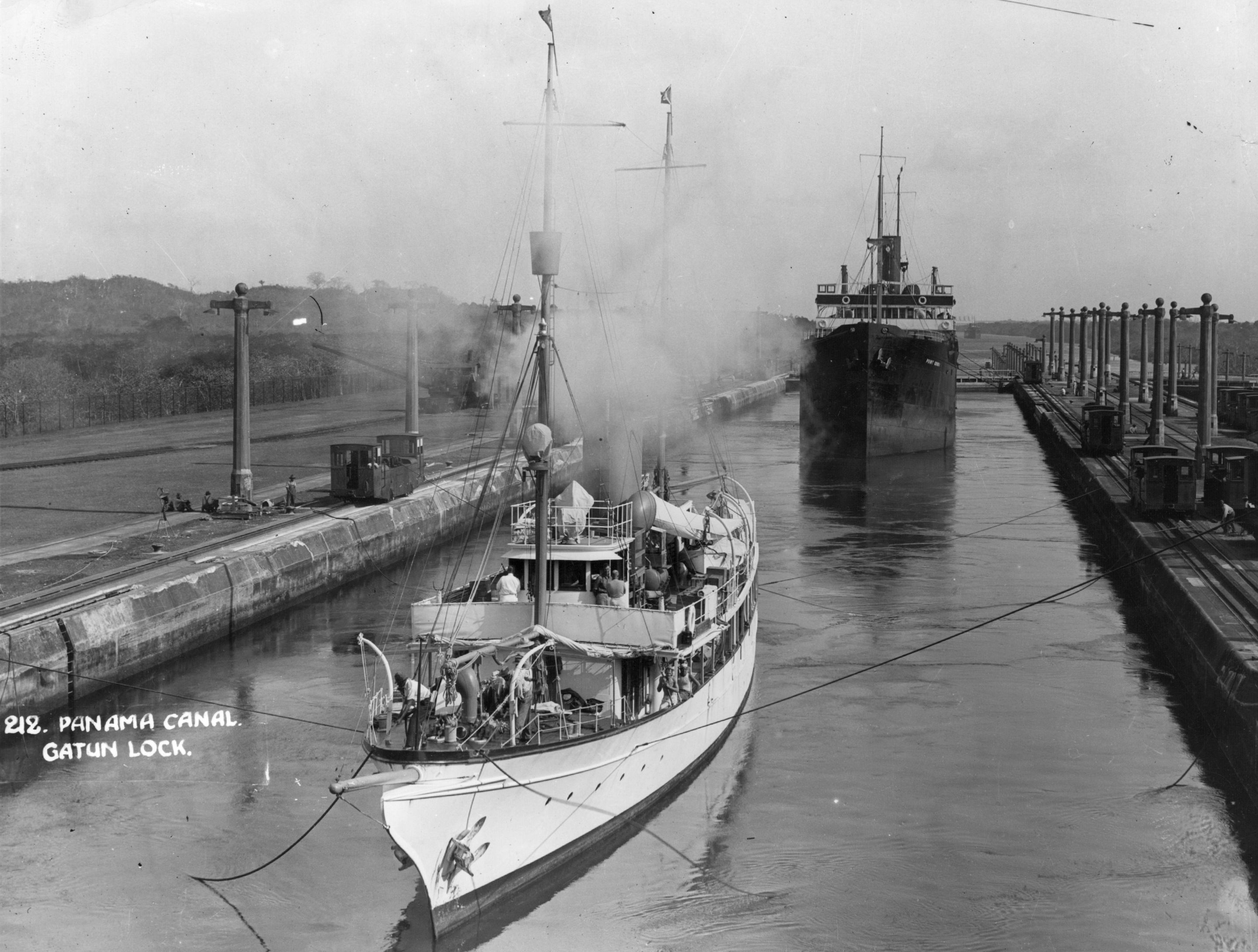 Ships passed through the Panama Canal’s Gatun Locks in Jan. 1, 1915. The canal opened in 1914 and was designed for ships much smaller than many of those built today.