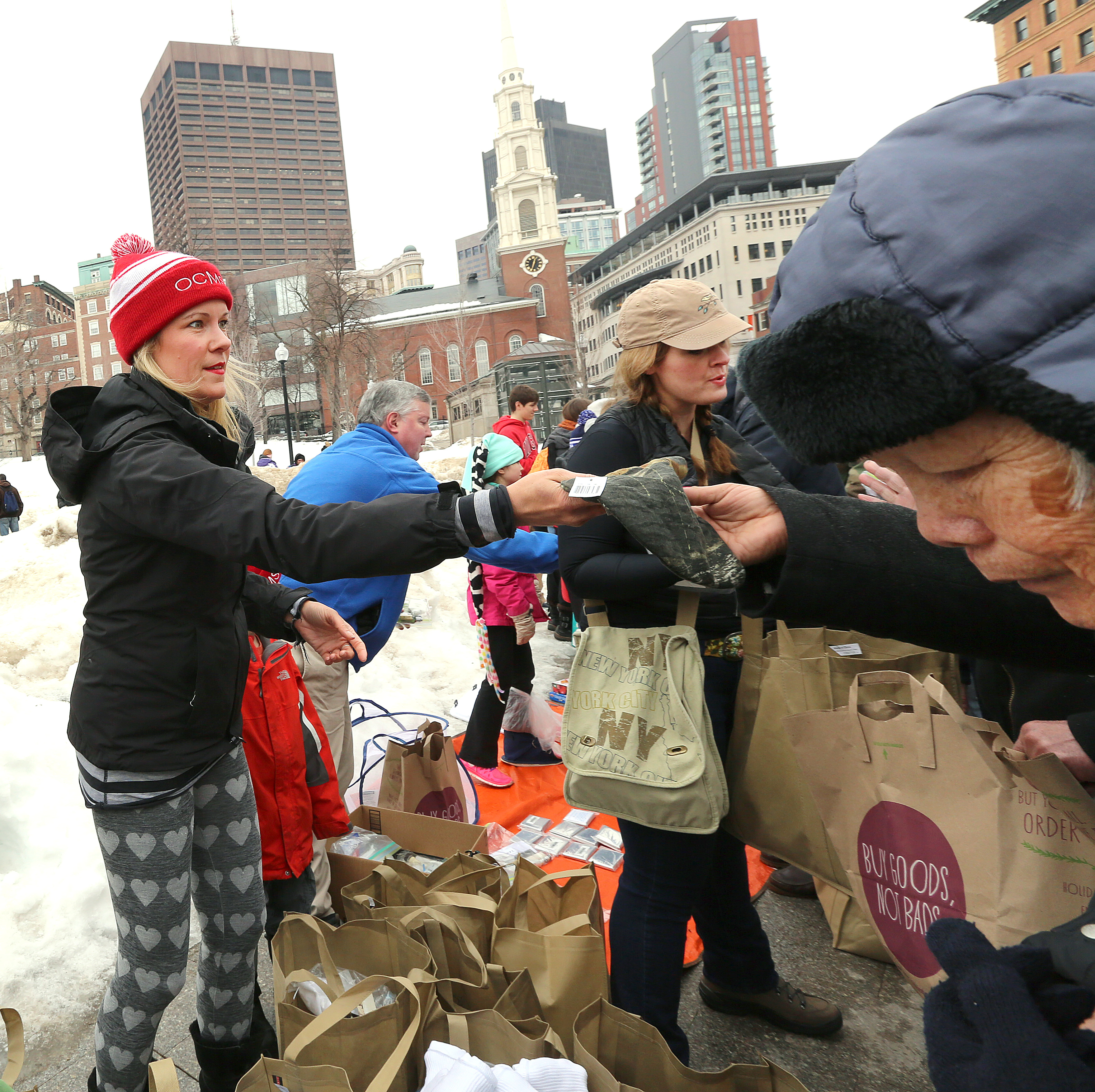 COPE volunteers handed out clothing, toiletries, and food to people on Boston Common.