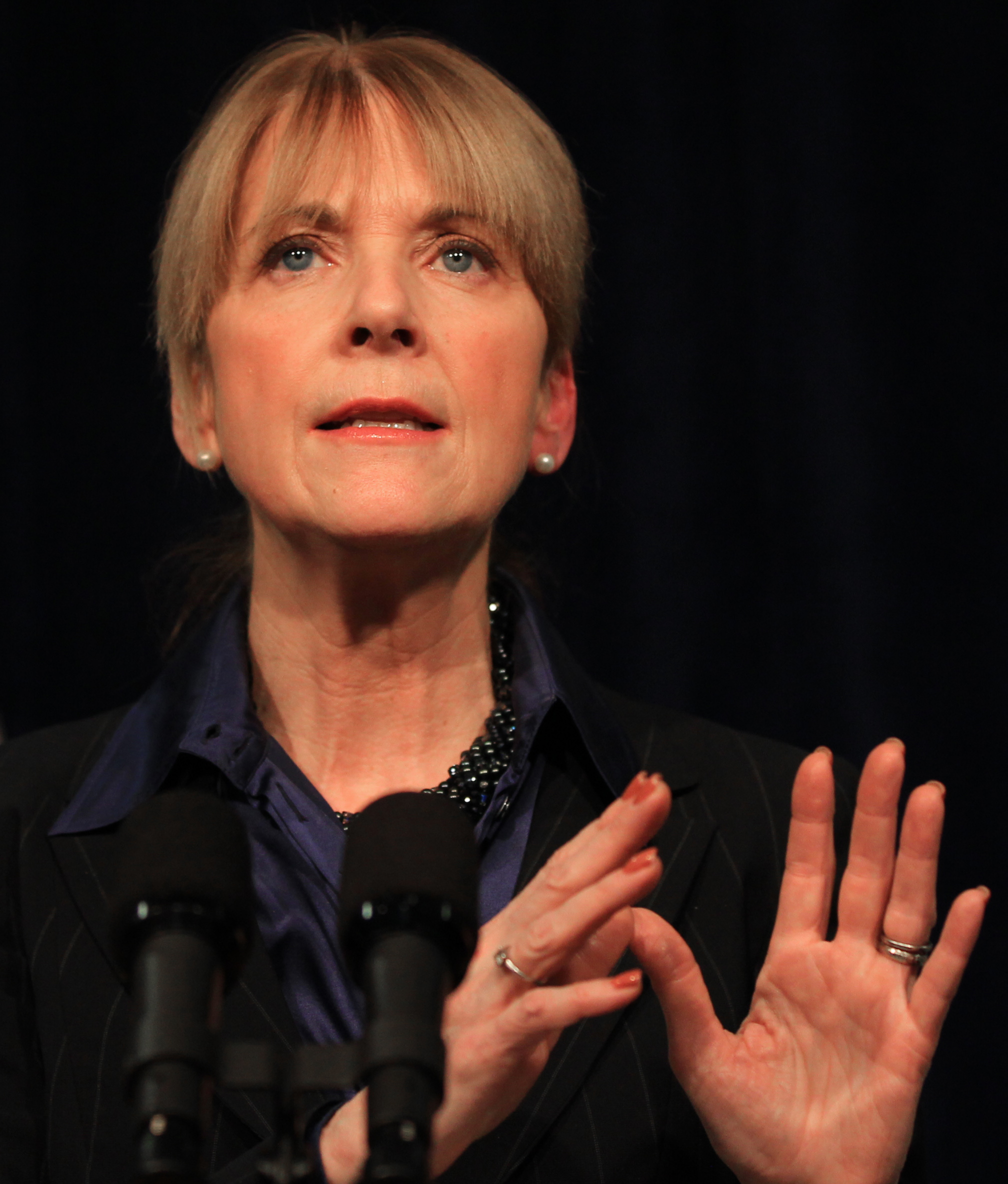Attorney General Martha Coakley says new state rules aim to avert foreclosures.
