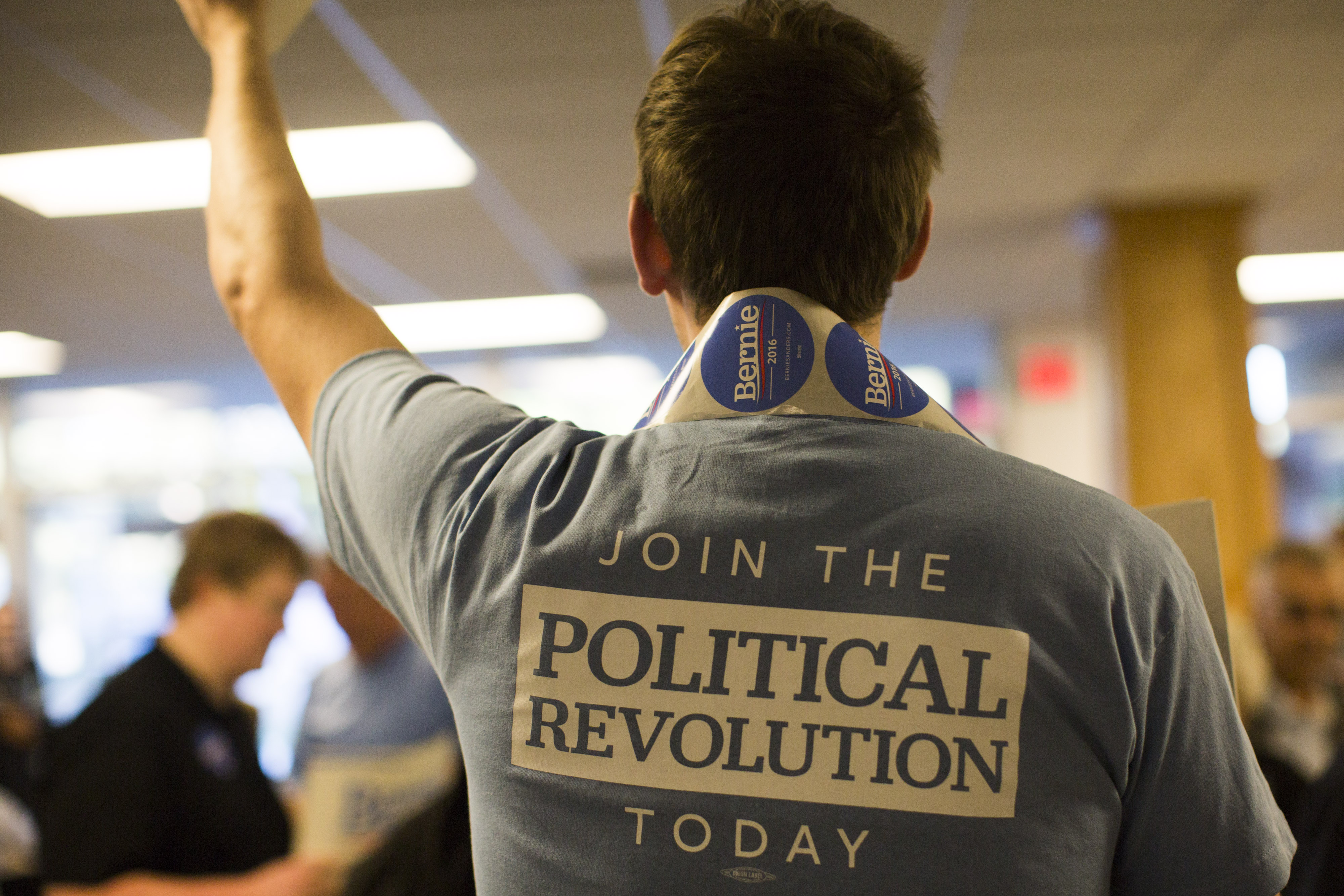 A volunteer for Sanders directed guests to a campaign rally at the University of New Hampshire in Durham.