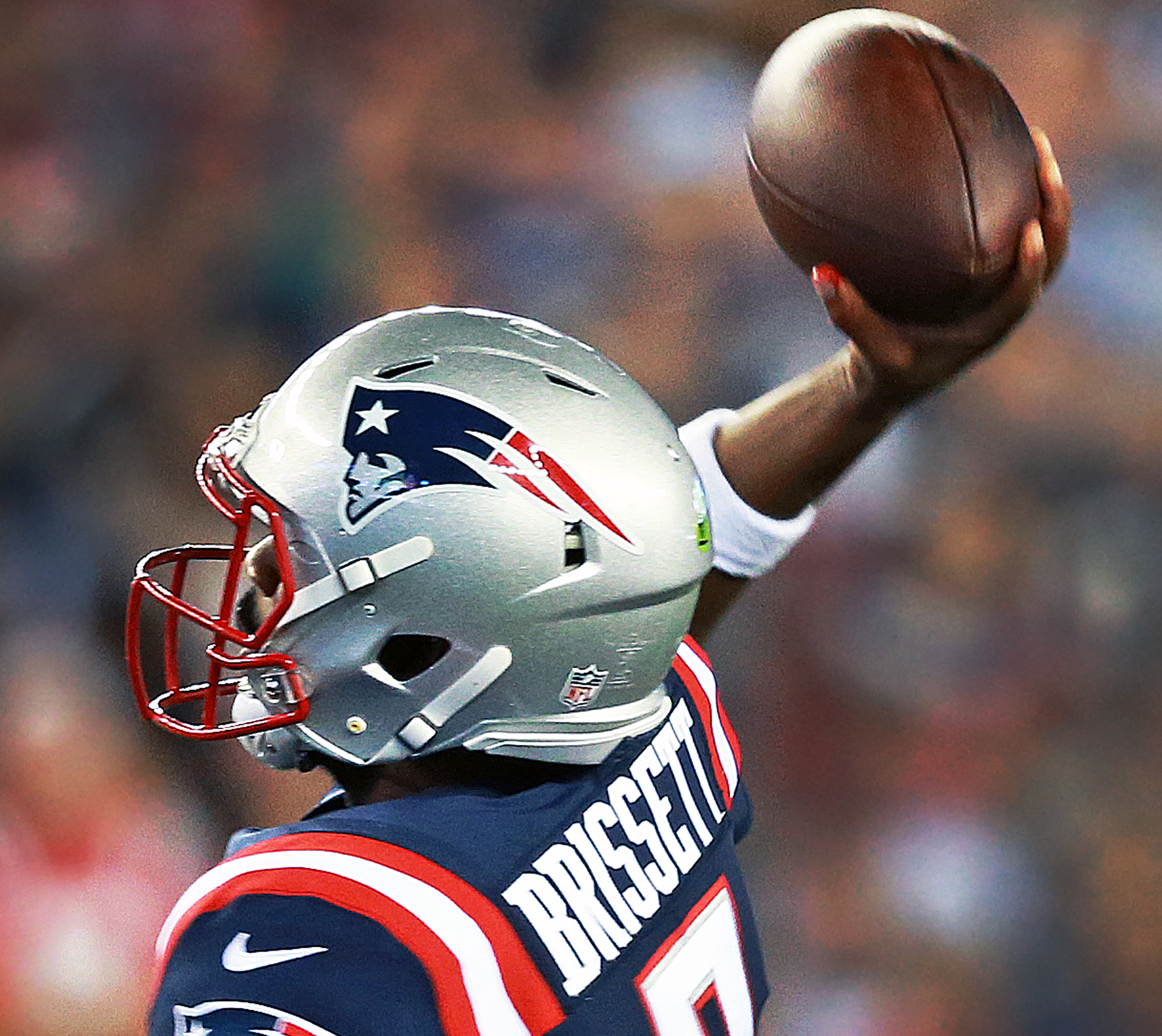 The right thumb of Patriots quarterback Jacoby Brissett appears to be bleeding as he throws an early third quarter pass.