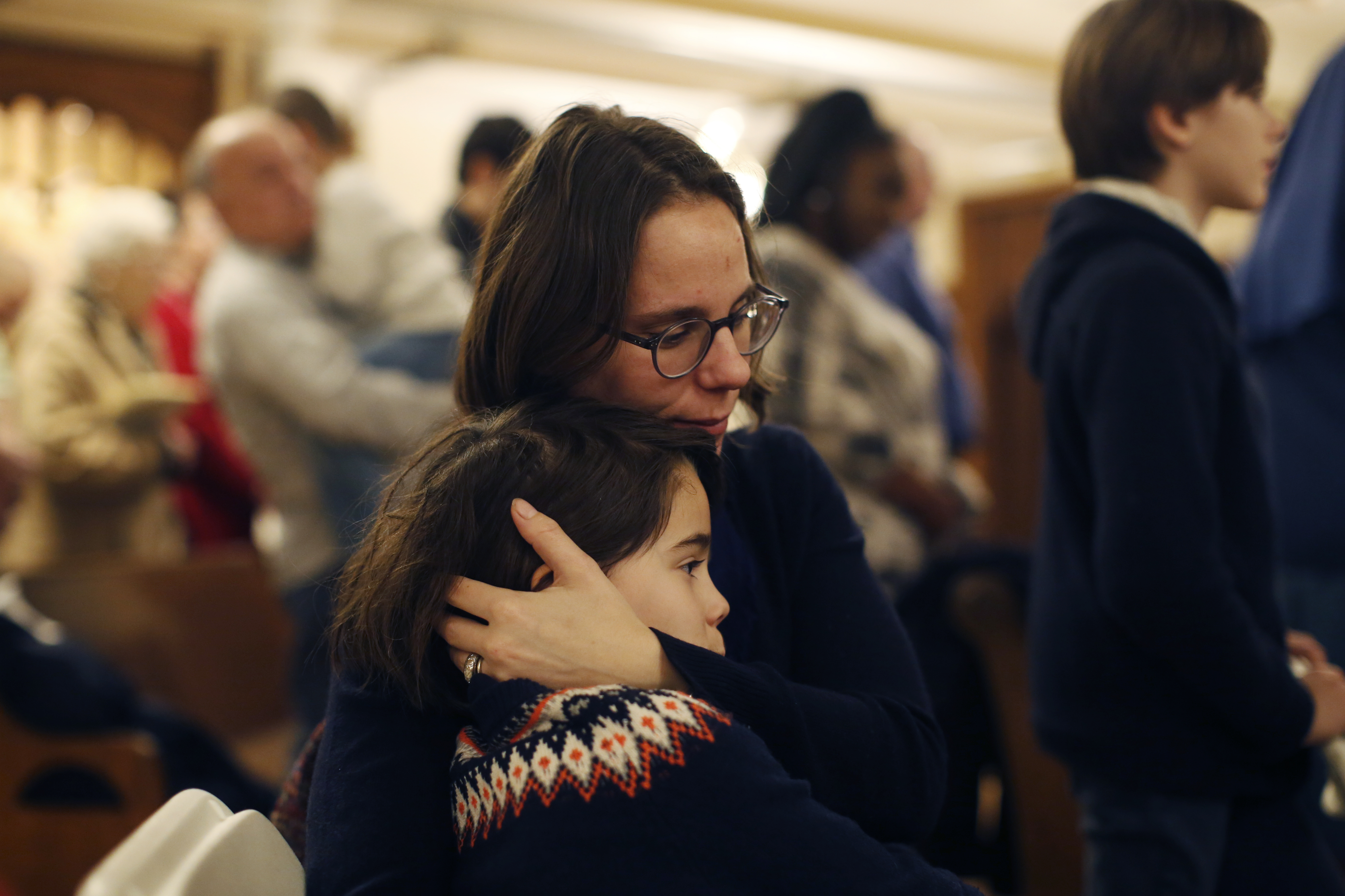 Marguerite Lelievre and her daughter Madeleine embraced the service.