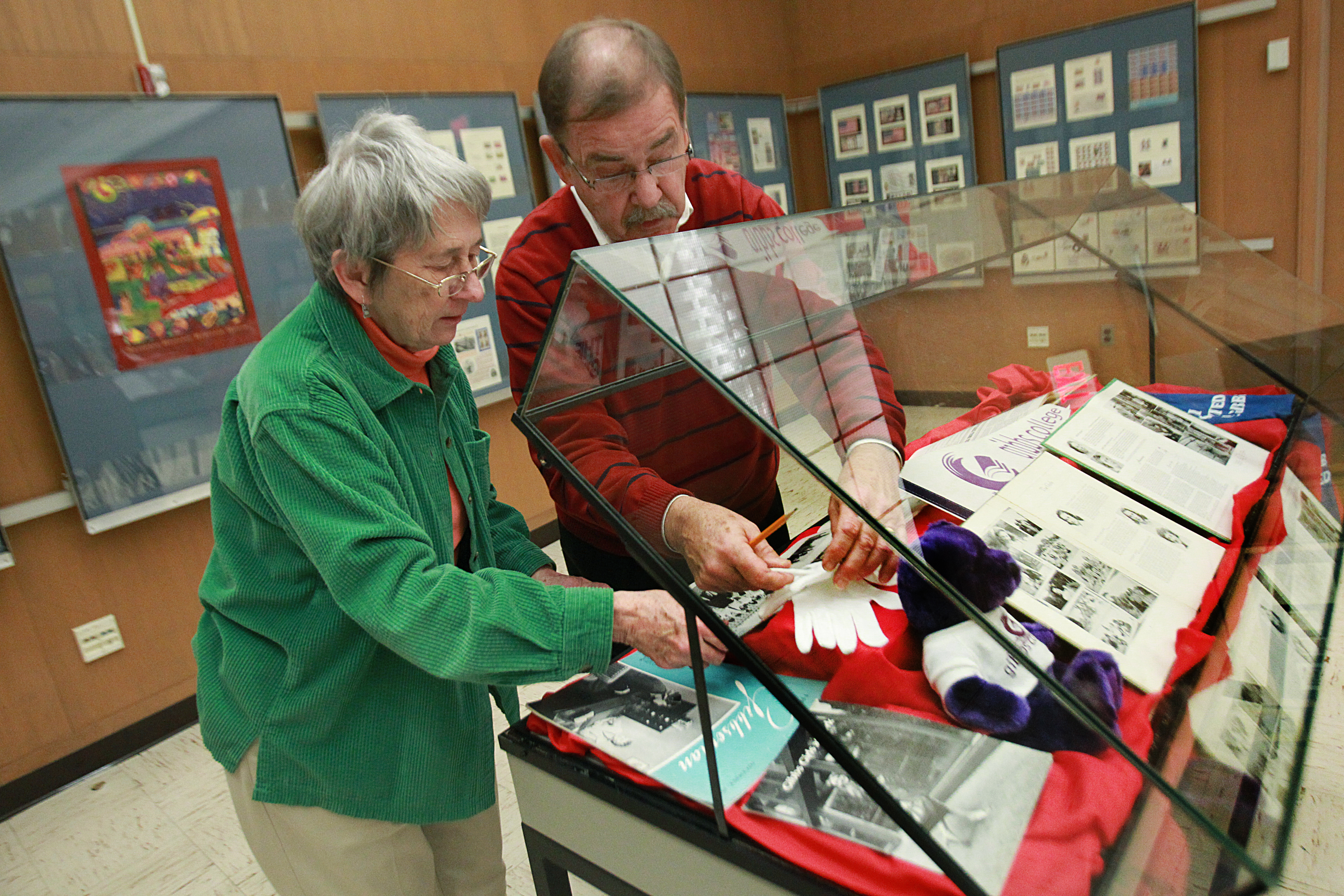 Rose A. Doherty (left), who spent nearly half of her life connected with the school, worked on the exhibit with Henry Lukas, the Spellman’s education director.