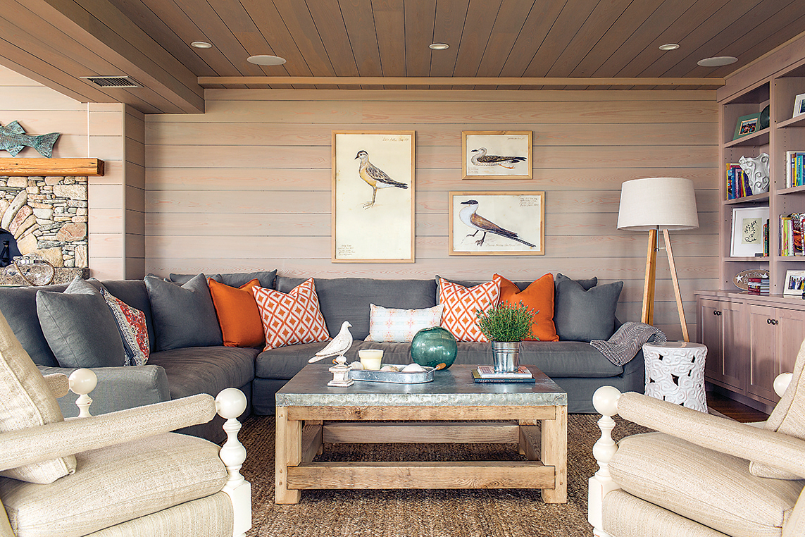 Bird prints from Williams Sonoma make more sense than expensive artwork in the living room — the couple’s young kids like to jump on the sofa.