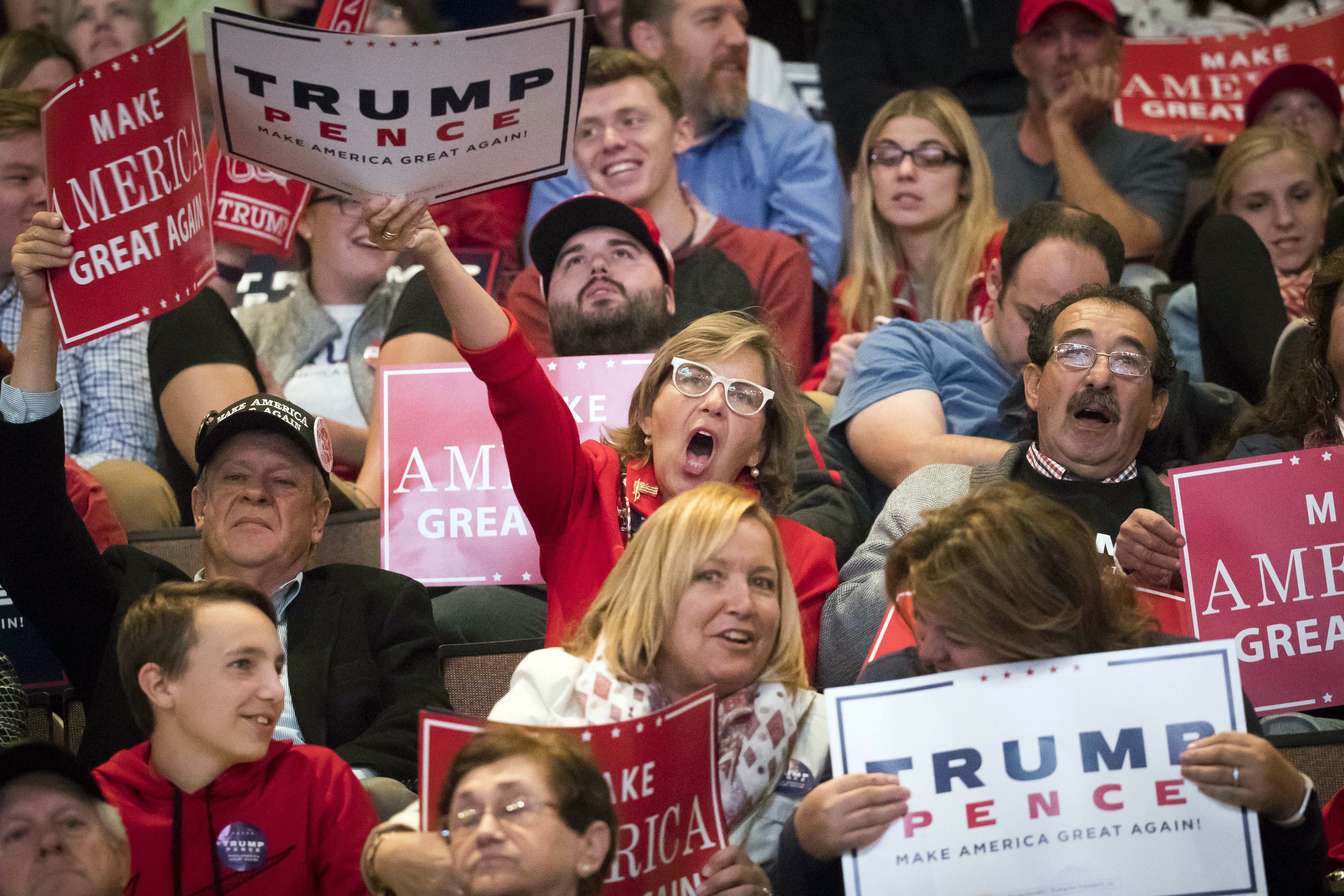Supporters of Republican presidential candidate Donald Trump cheered during a campaign rally Thursday in Cincinnati.