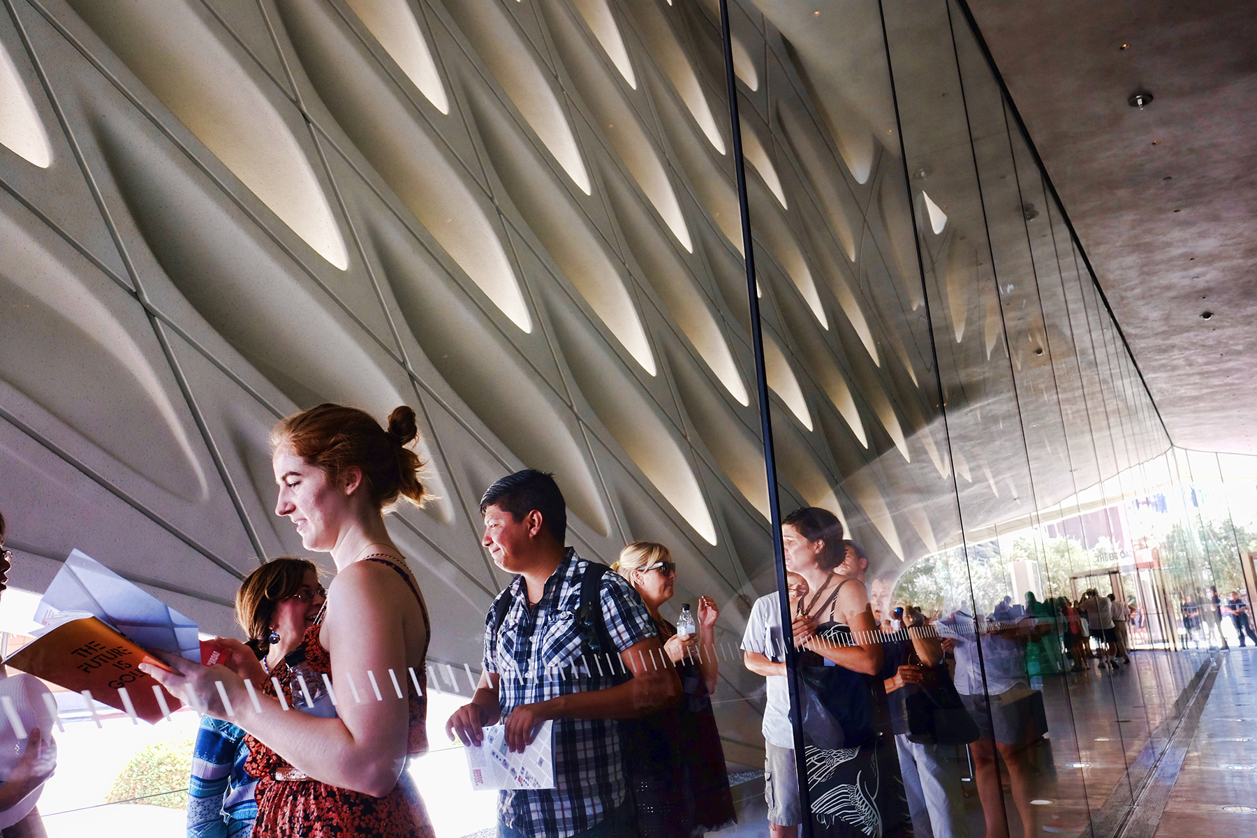 Visitors wait in line to enter The Broad Museum on opening day.