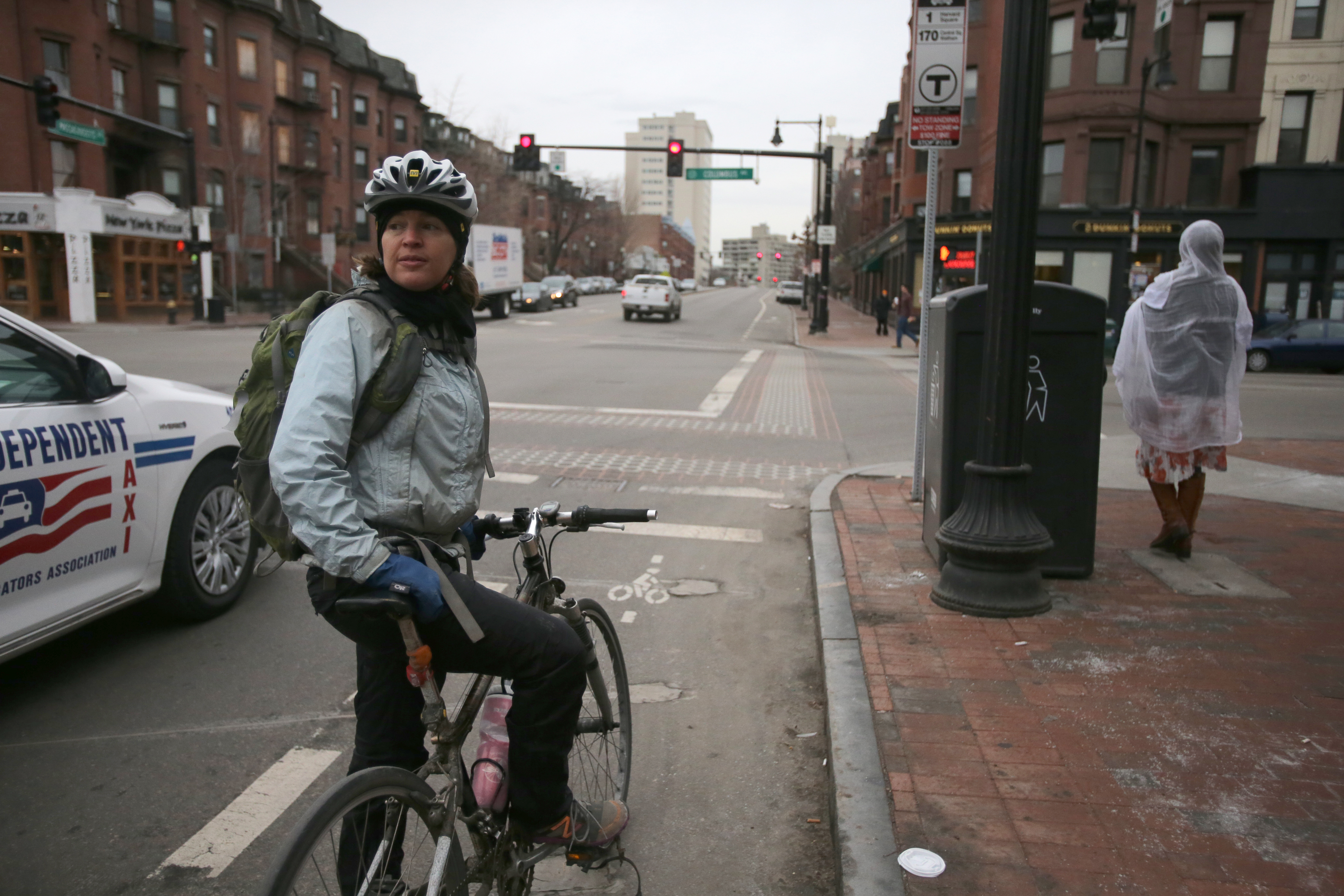 Nicole Freedman, former head of the city’s “Boston Bikes” initiative, paused for a light on Masssachusetts Avenue in this 2013 file photo. She was instrumental in the implementation of a bike lane on the street.