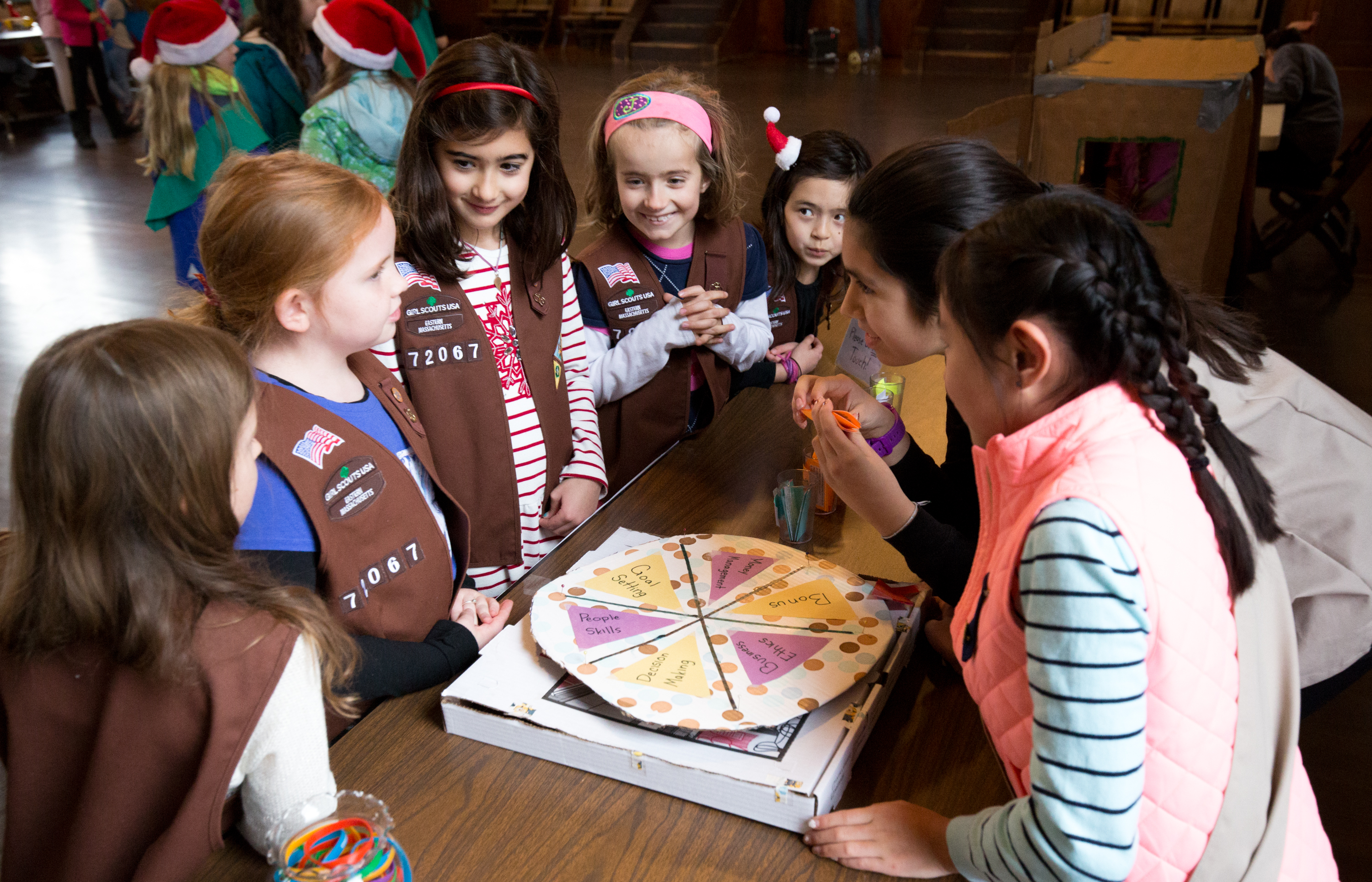 Girls play a cookie-themed trivia game at the annual Cookie Kickoff at the the Concord Scout House.