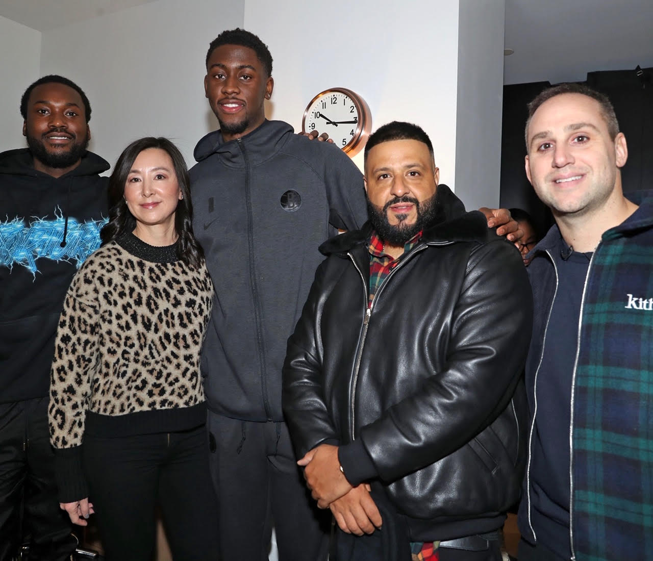 (From left) Meek Mill, Brooklyn Nets co-owner Clara Wu Tsai, Nets player Caris LeVert, DJ Khaled, and Michael Rubin pose before kicking off a special day for dozens of kids organized by Patriots owner Robert Kraft and other REFORM Alliance advocates.