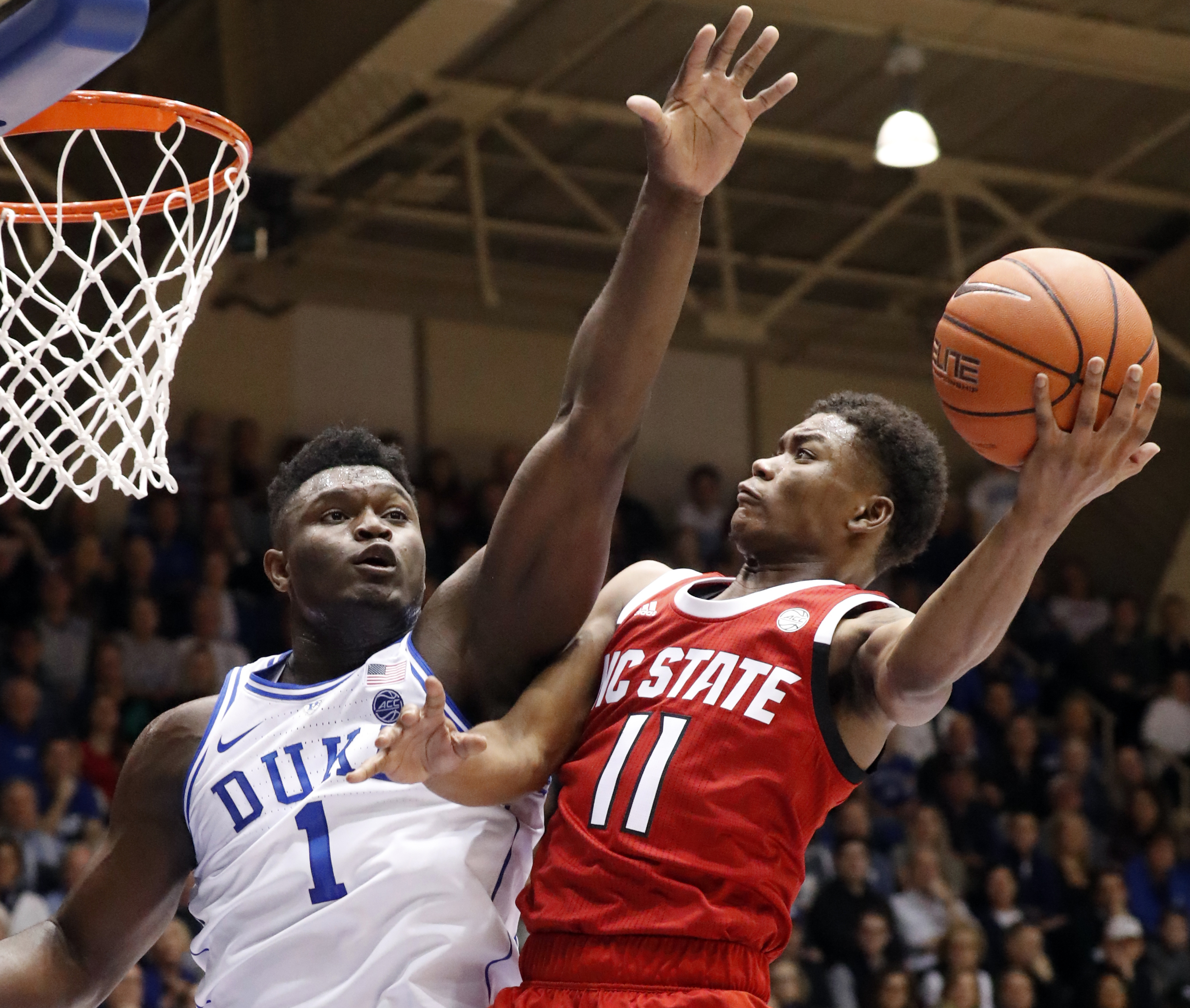 TNT analyst Kenny Smith says Duke’s Zion Williamson, left, could play multiple positions in the NBA.