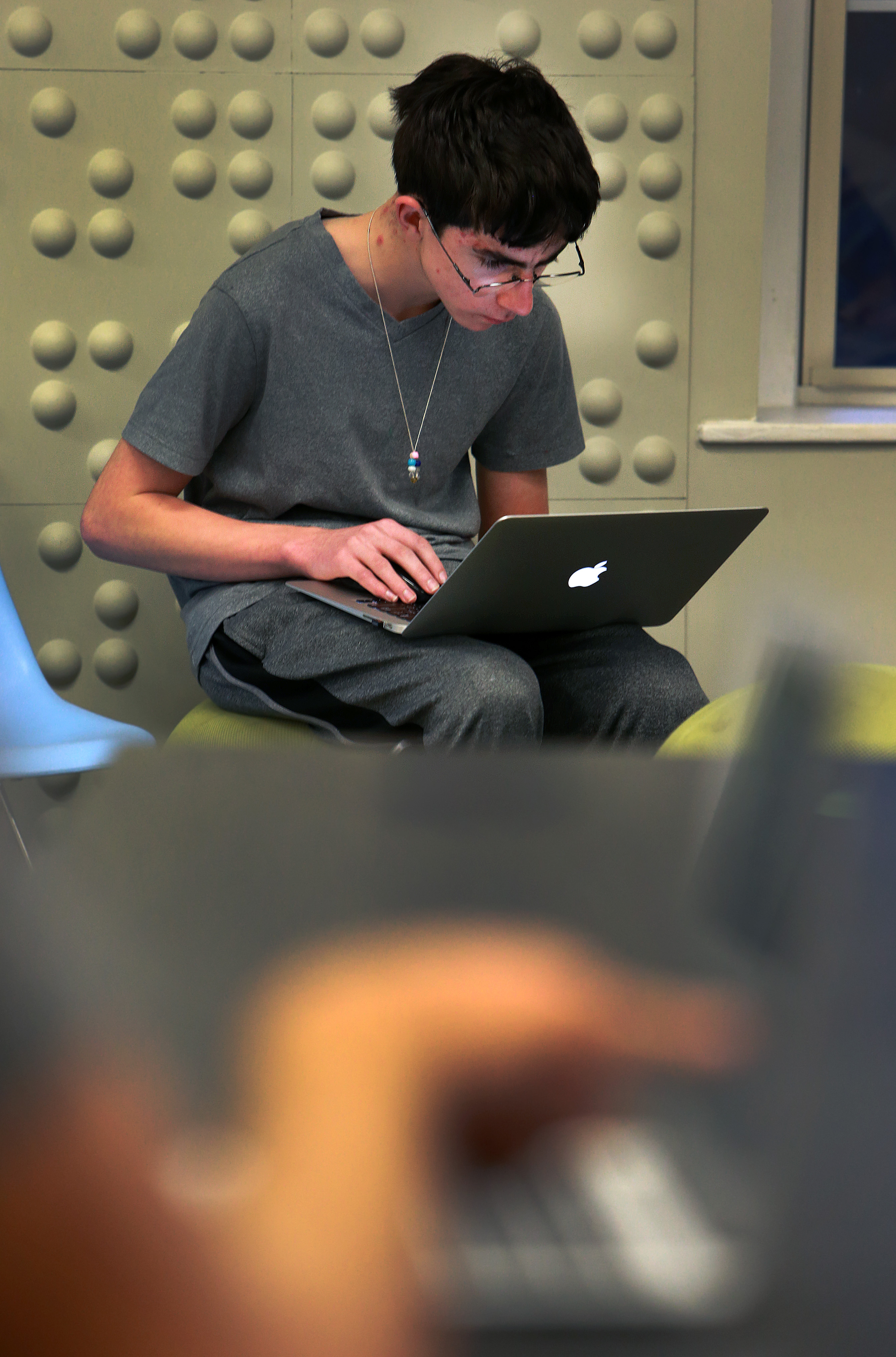 Brayden Toth, 14, of Byfield focuses on coding.