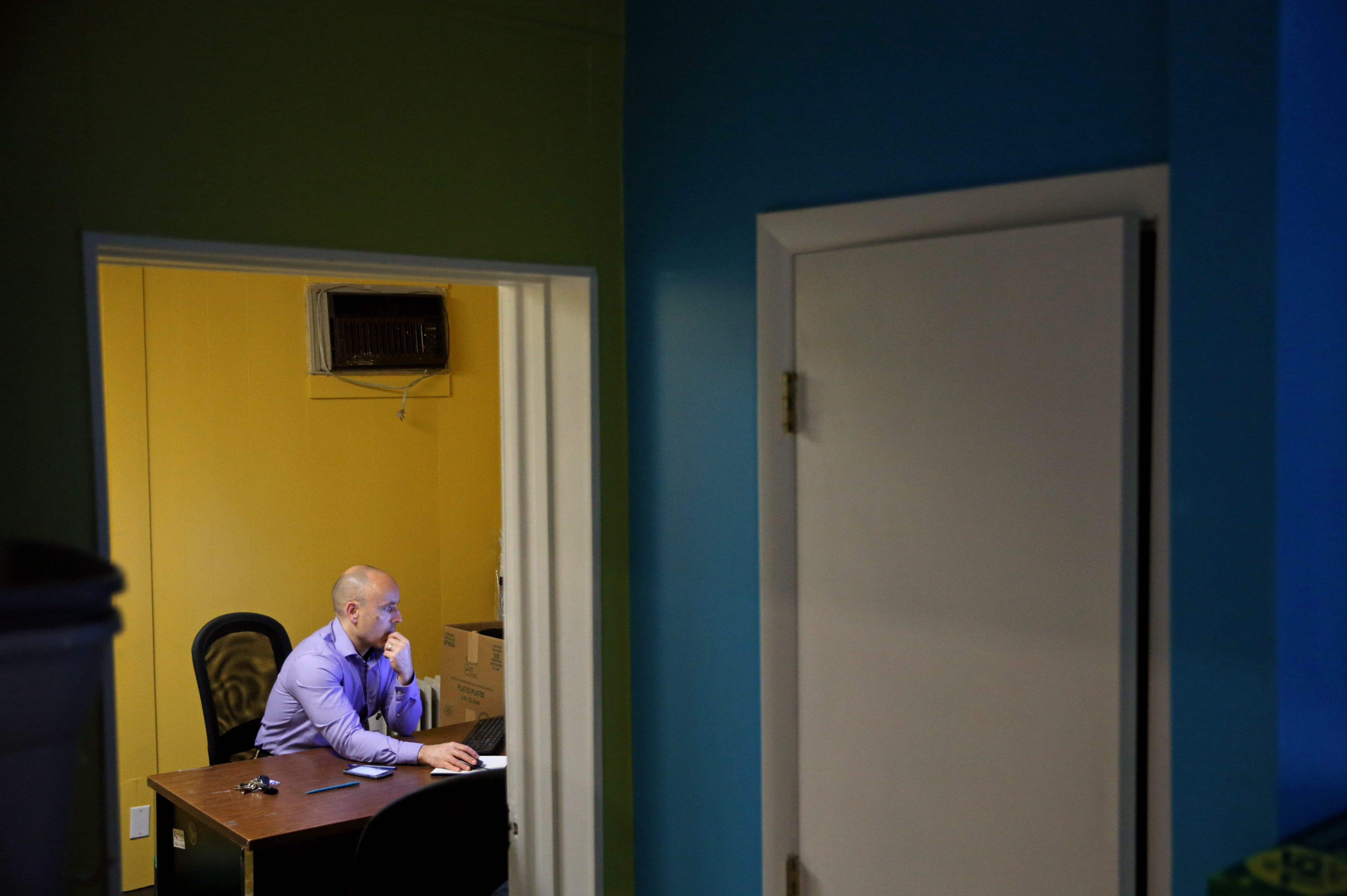 Founder and owner of Carryout Courier, Chad Eisenhart, sat in his office at in York, Pa., last month.