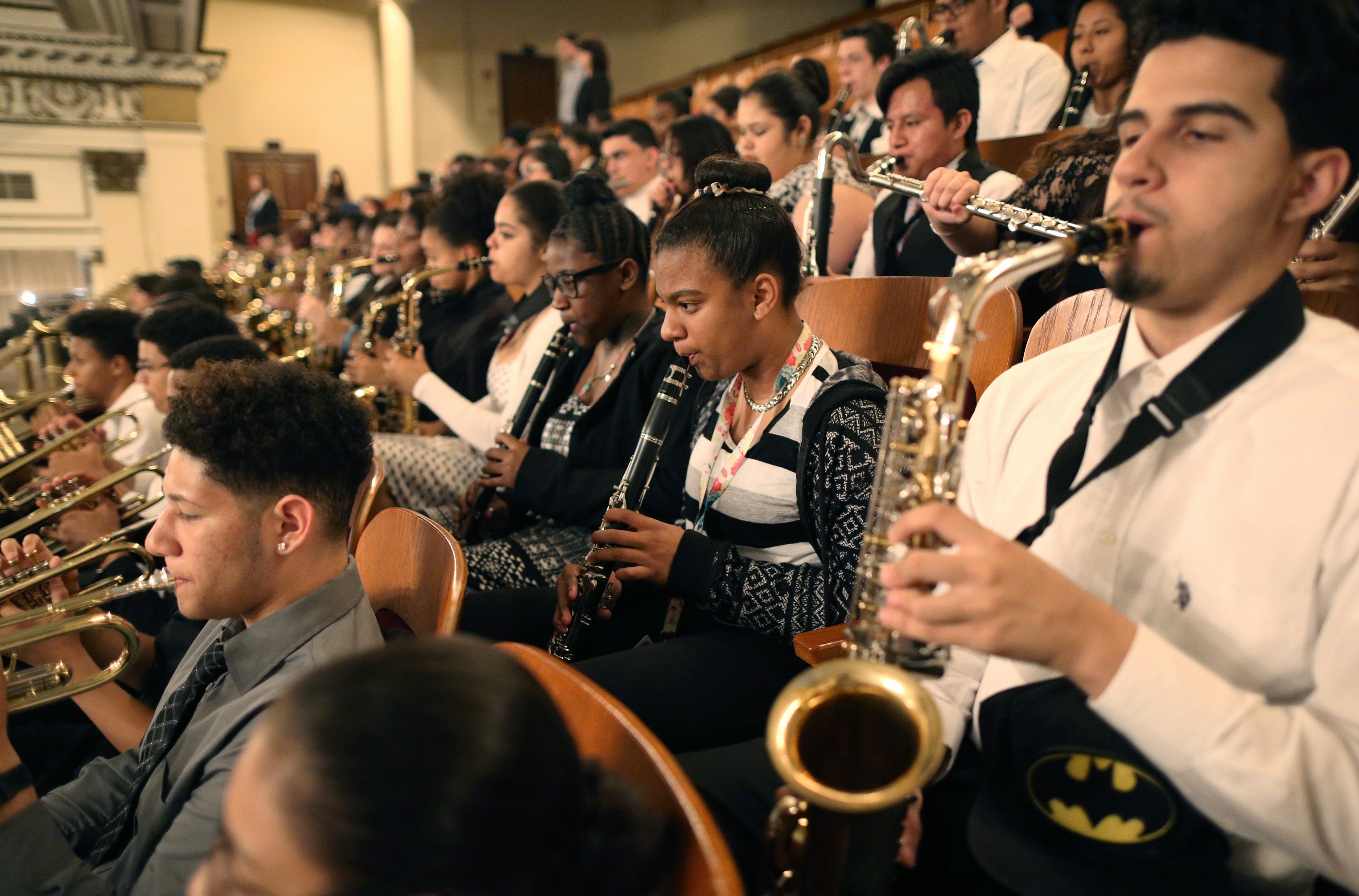 Freshman Yumarelis Webb (center) played the clarinet during a rehearsal.