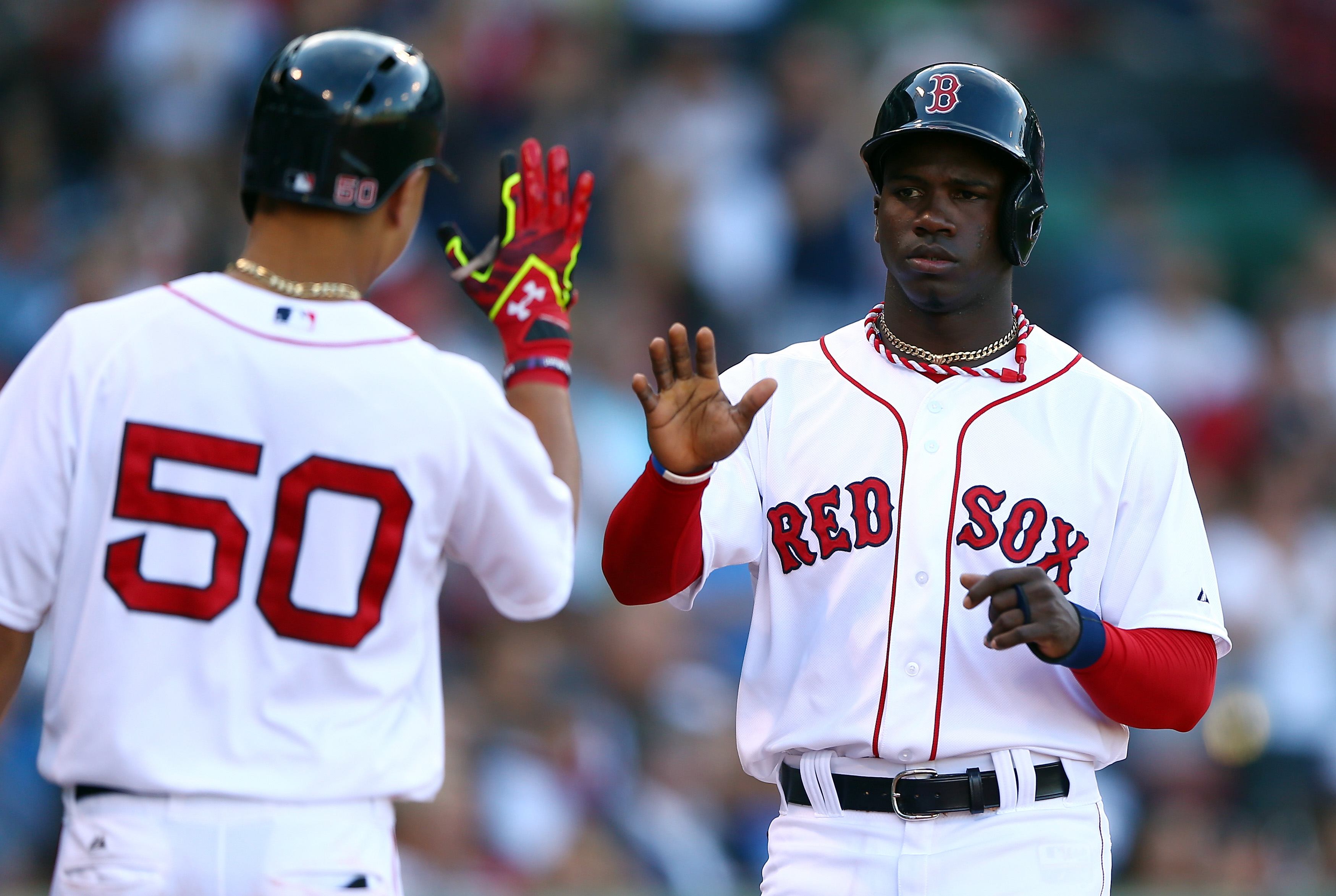 Rusney Castillo (right) hit .333 in 40 major-league plate appearances at the end of last season.