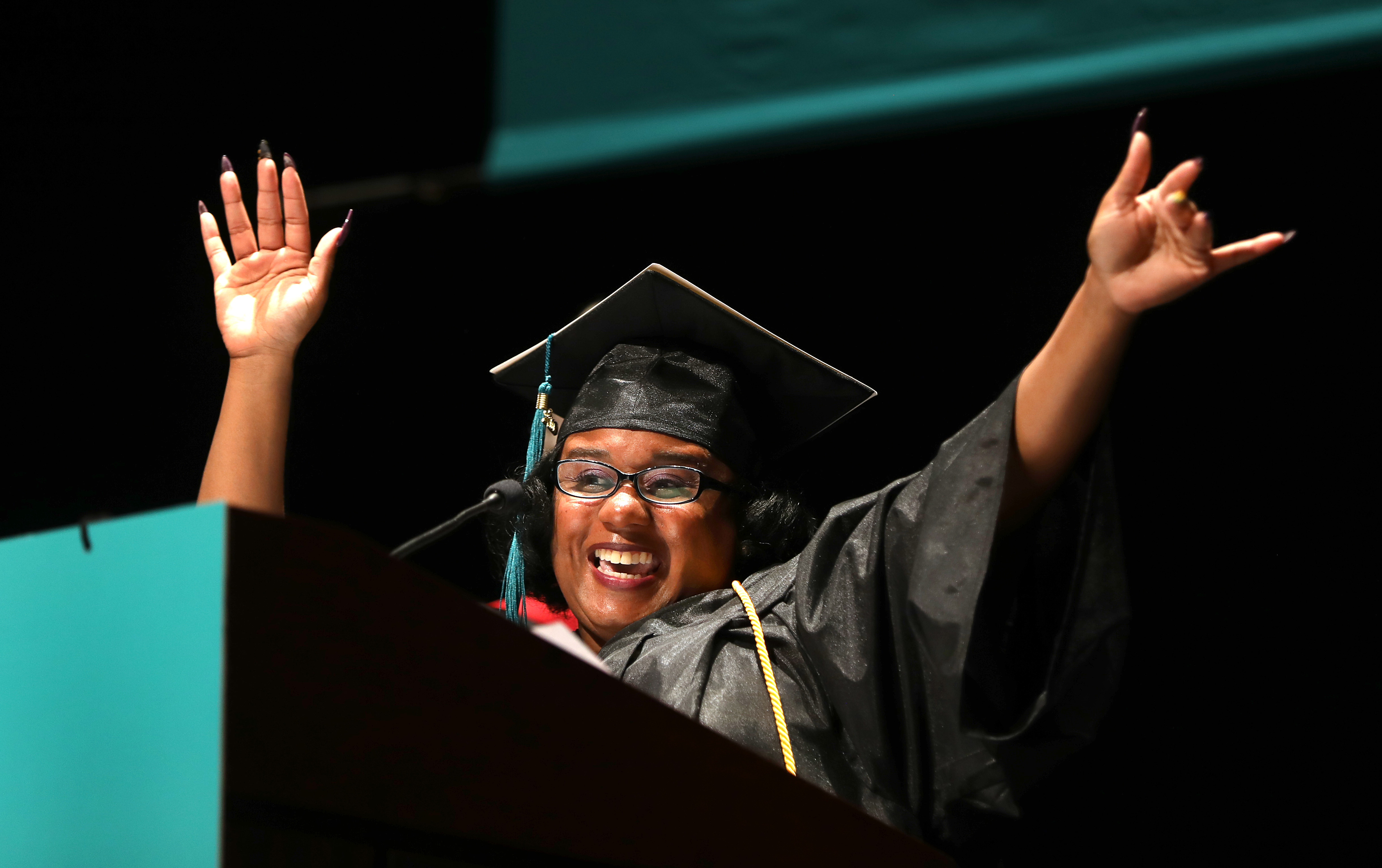 “As a single mom it was really important for me to show my son that education is really important,” said Arlene Wilhite (above), who graduated with the school’s highest honors.