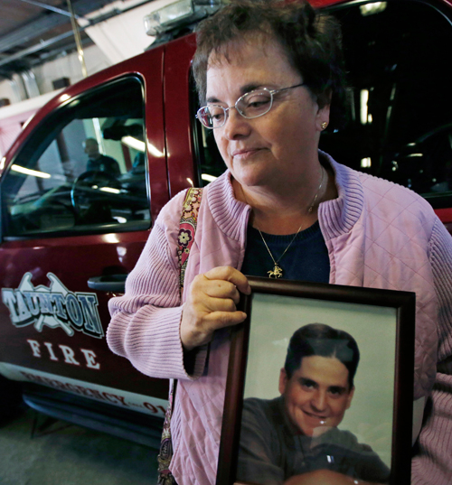 Susan Cyr held a photo of her son, Eric, who died recently at the age of 32 of a heroin overdose.