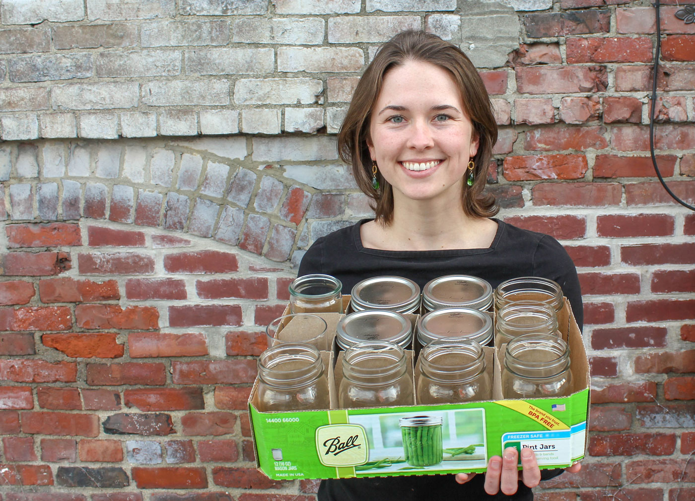 Environmental advocate Sarah Atkinson displays her set of reusable jars.