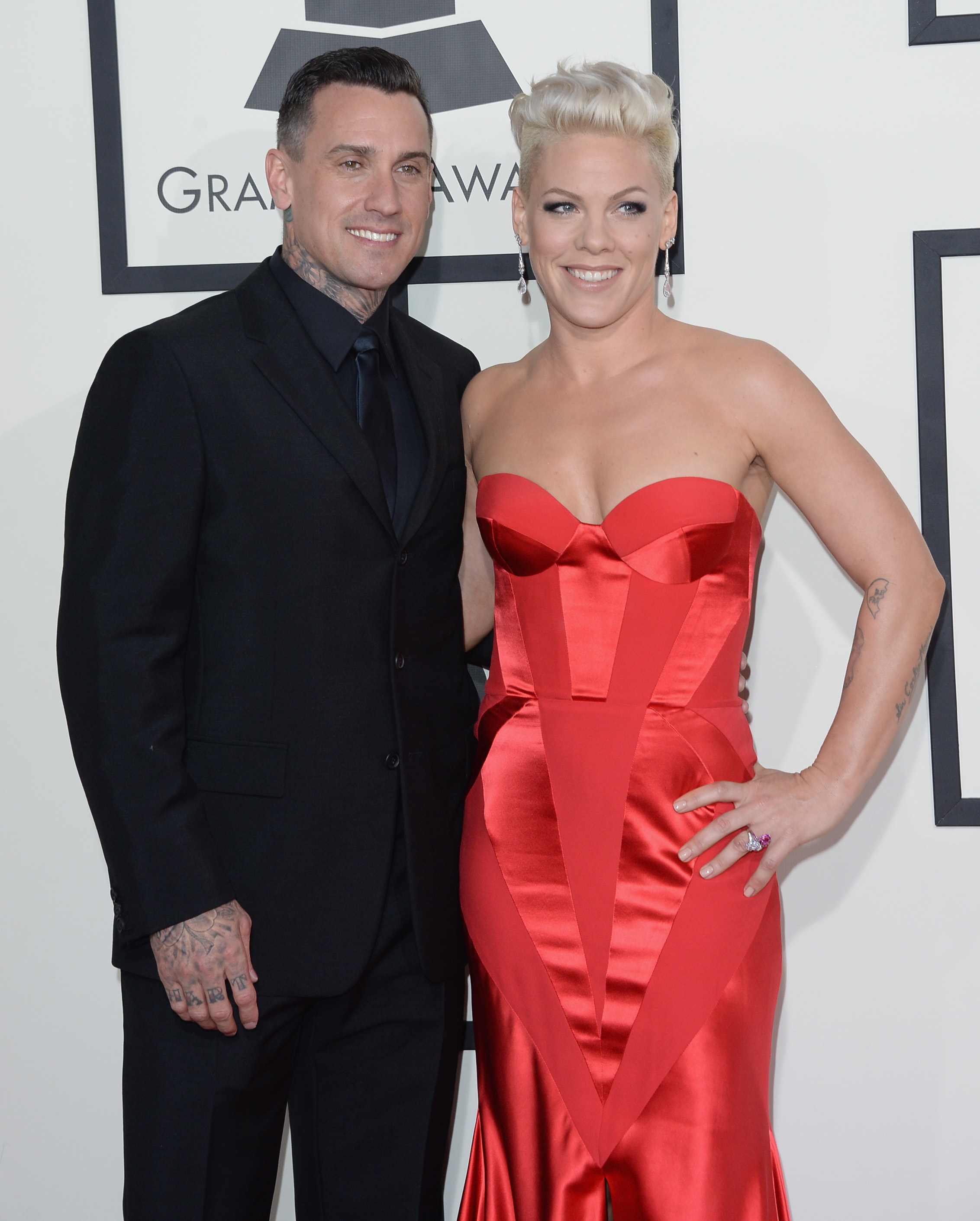 Pink (pictured with husband Carey Hart) will perform a duet with Chris Stapleton at the Country Music Association Awards.