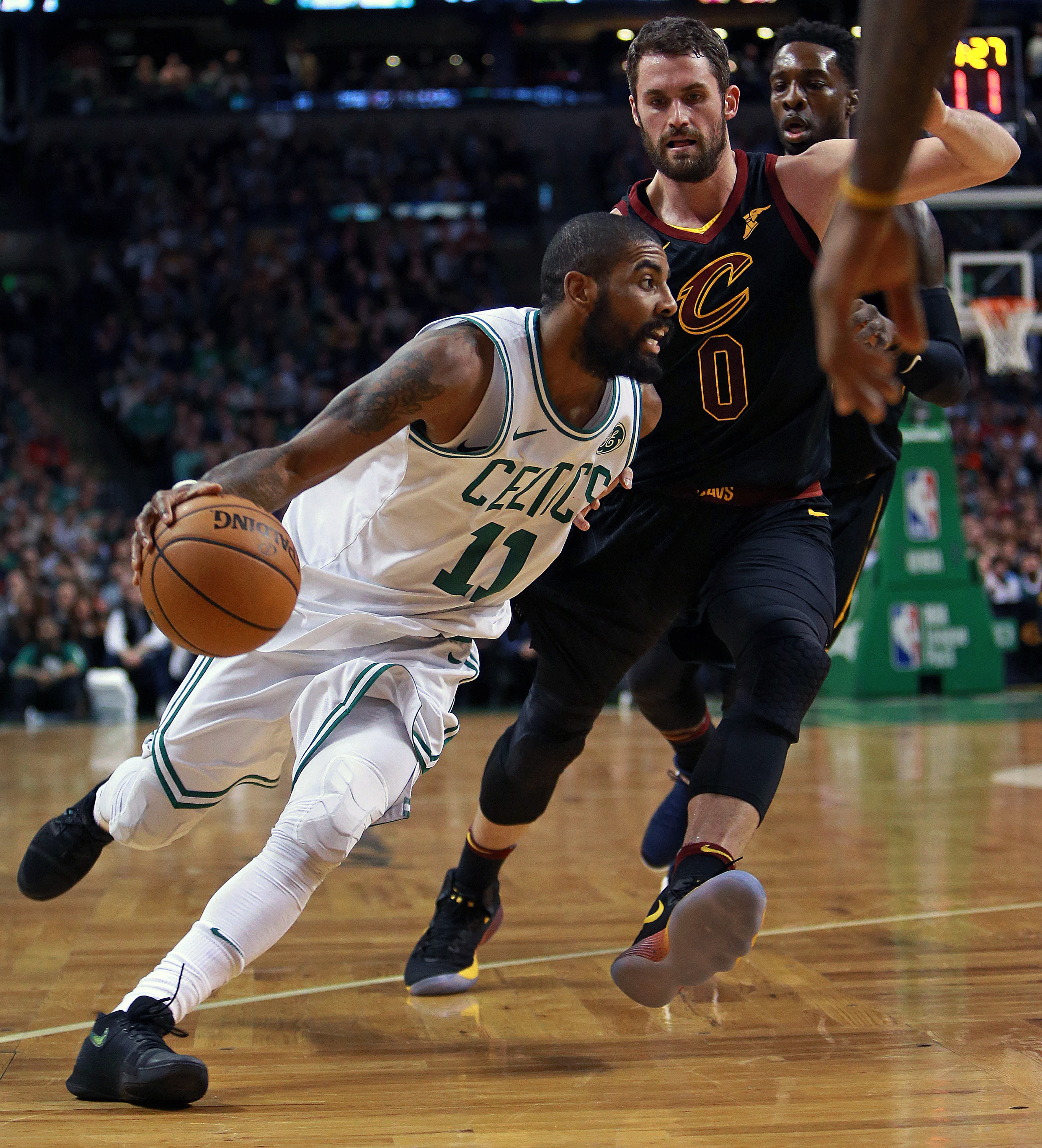 Kyrie Irving and the Celtics jumped ahead early and never looked back against Kevin Love and the Cavaliers.