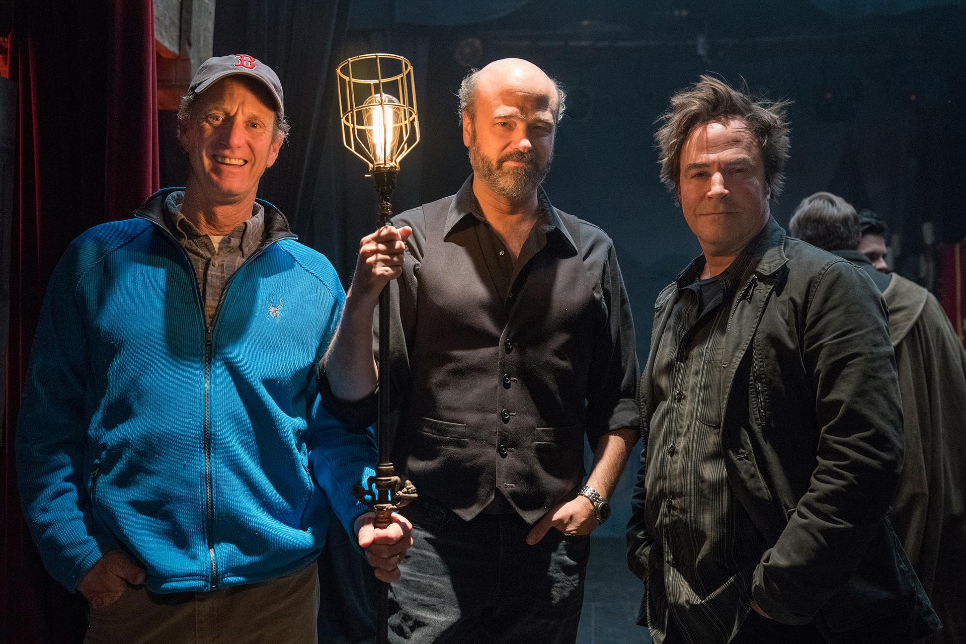 From left: Director John Stimpson, Scott Adsit, and Roger Bart on the set of “Ghost Light.”