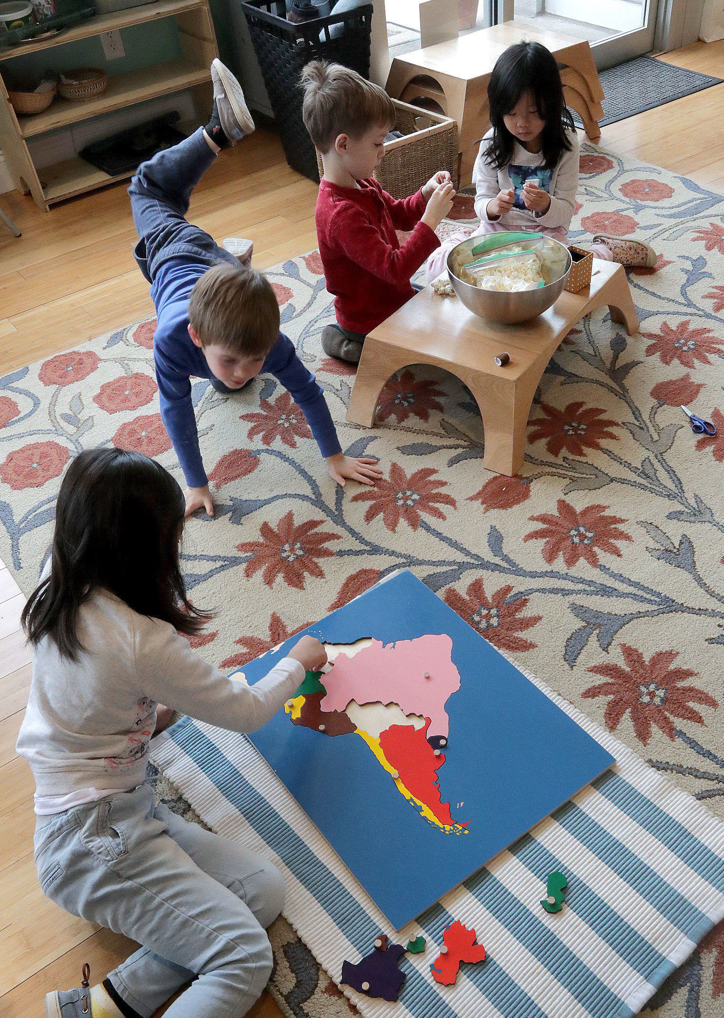 Students played at the Wild Rose Montessori school in Cambridge, one of seven Wildflower schools in the city.