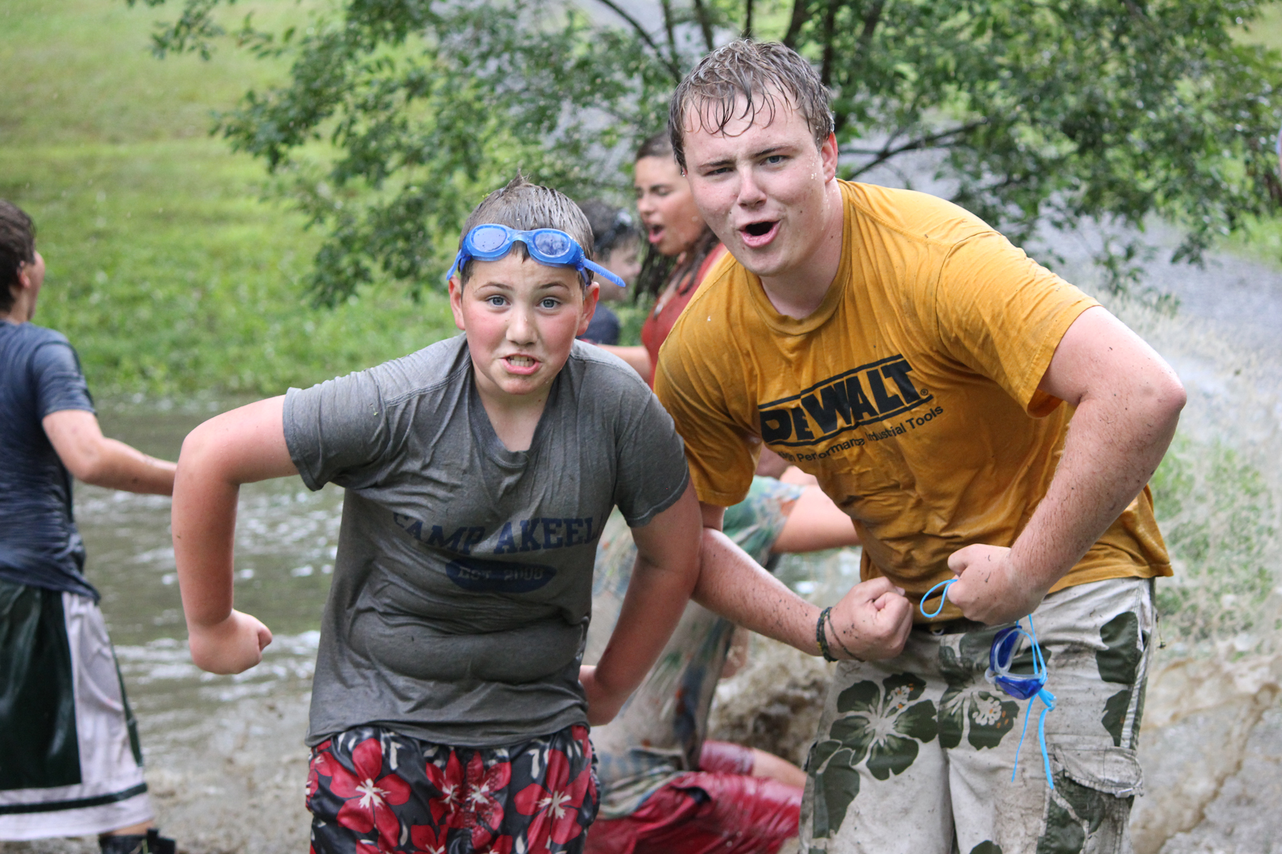 Campers and counselors enjoy puddle jumping at Camp Akeela in Vermont.