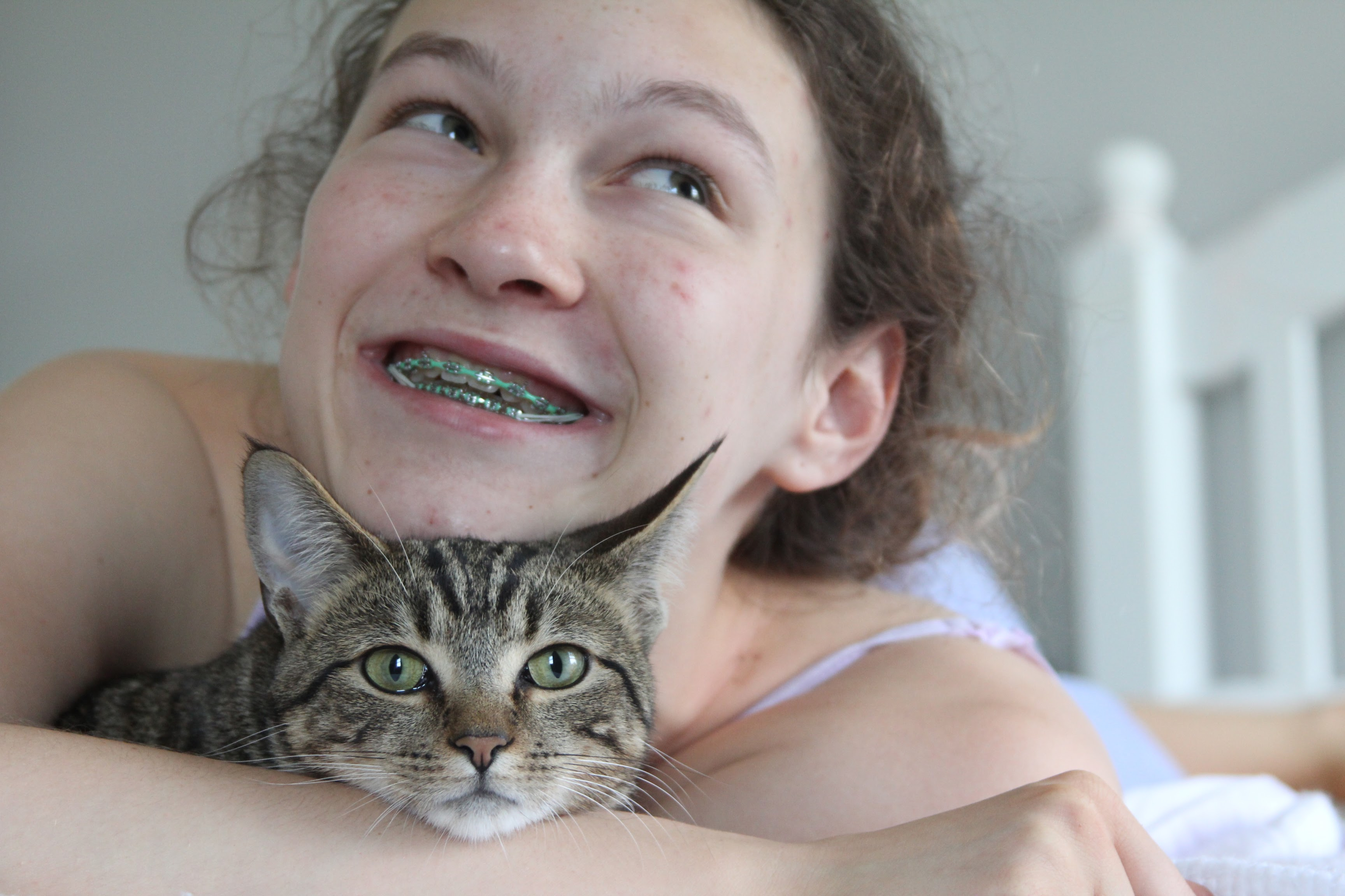 Alexandra with the family cat Scout.