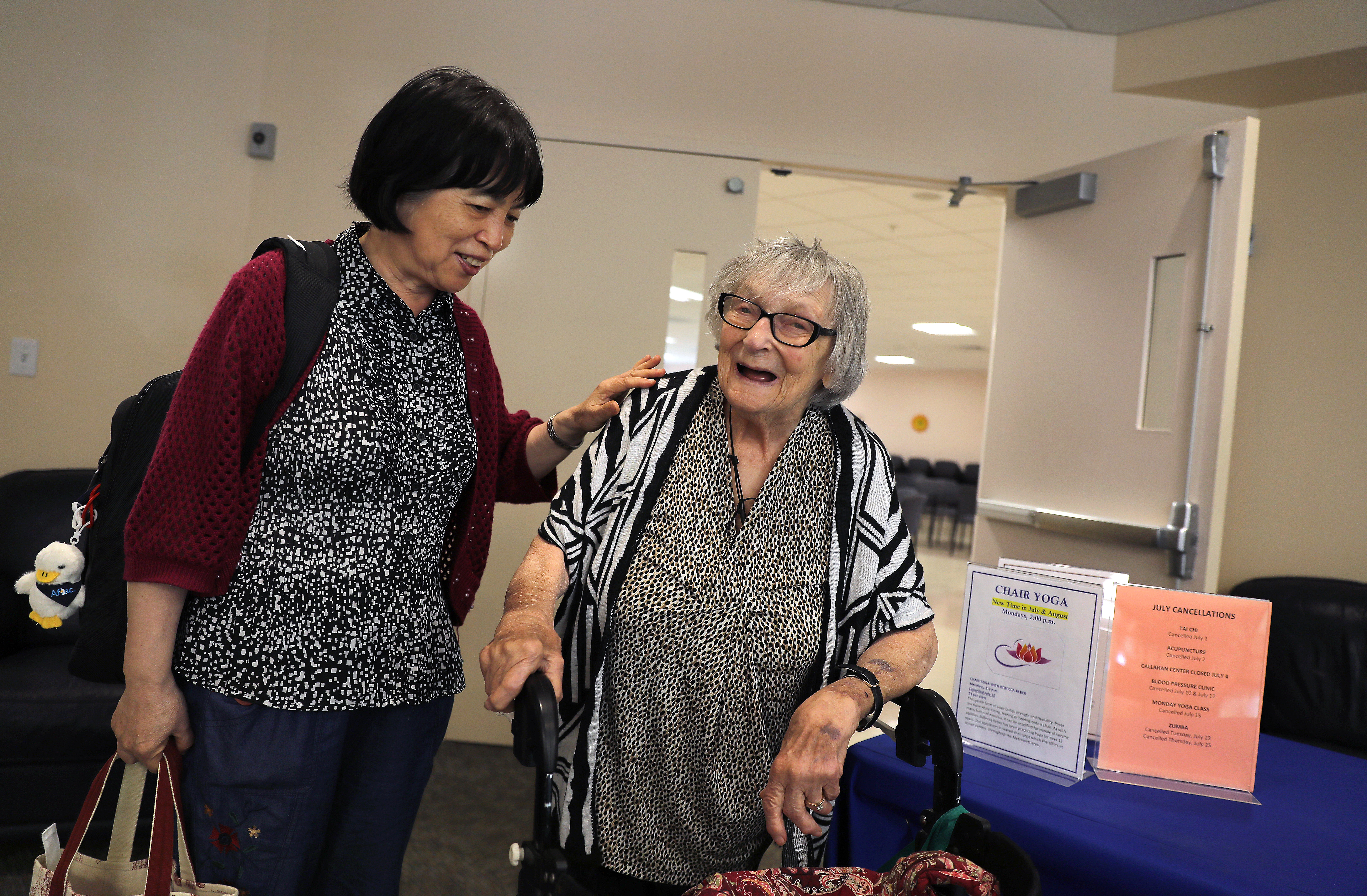 Ke Tang, 68, (left) and Thelma Brody, 83, met about three years ago at the Callahan Center in Framingham, where they play bingo.