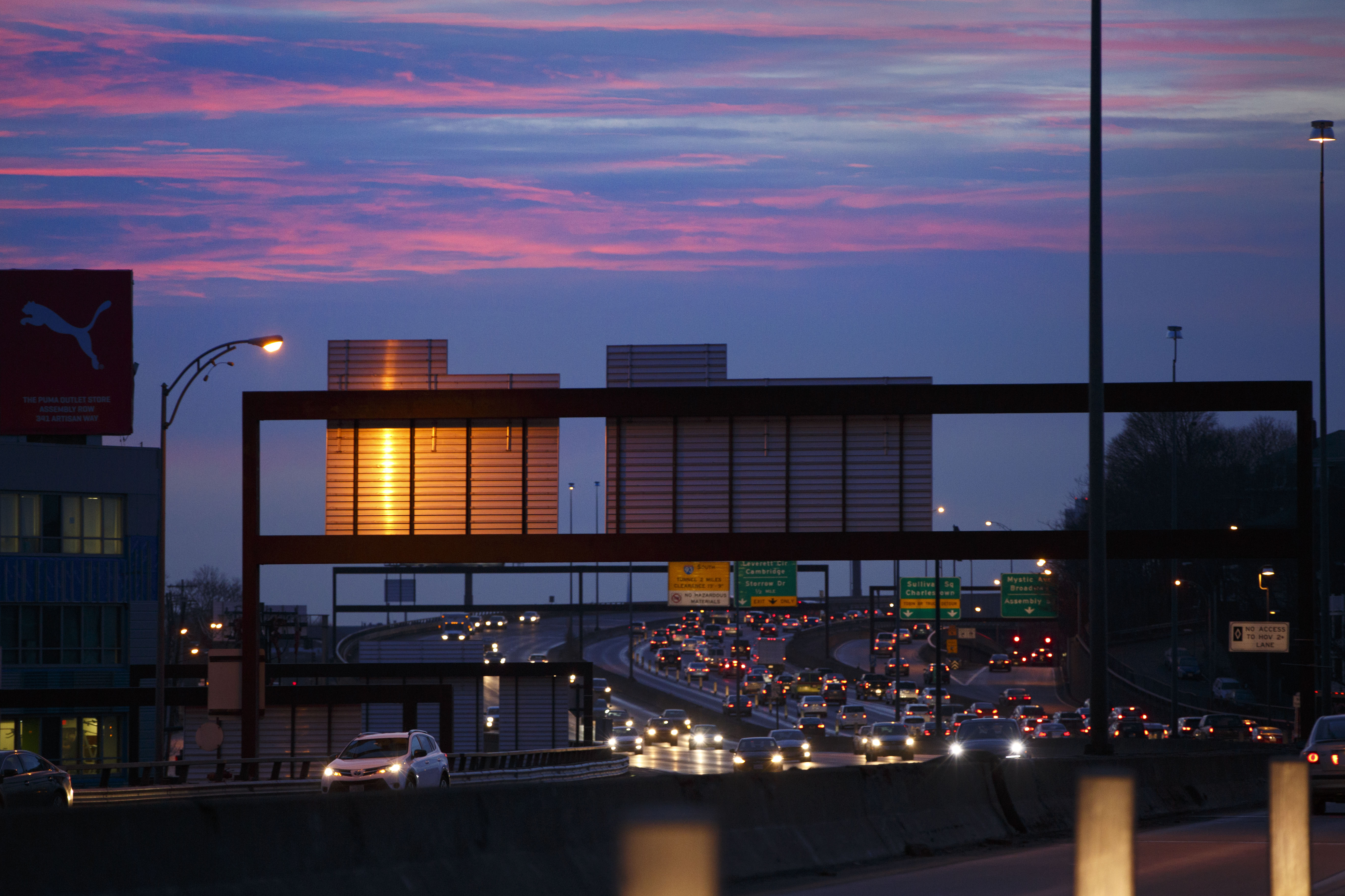 Traffic was slow on Interstate 93 in Somerville as the sun rose Monday morning.
