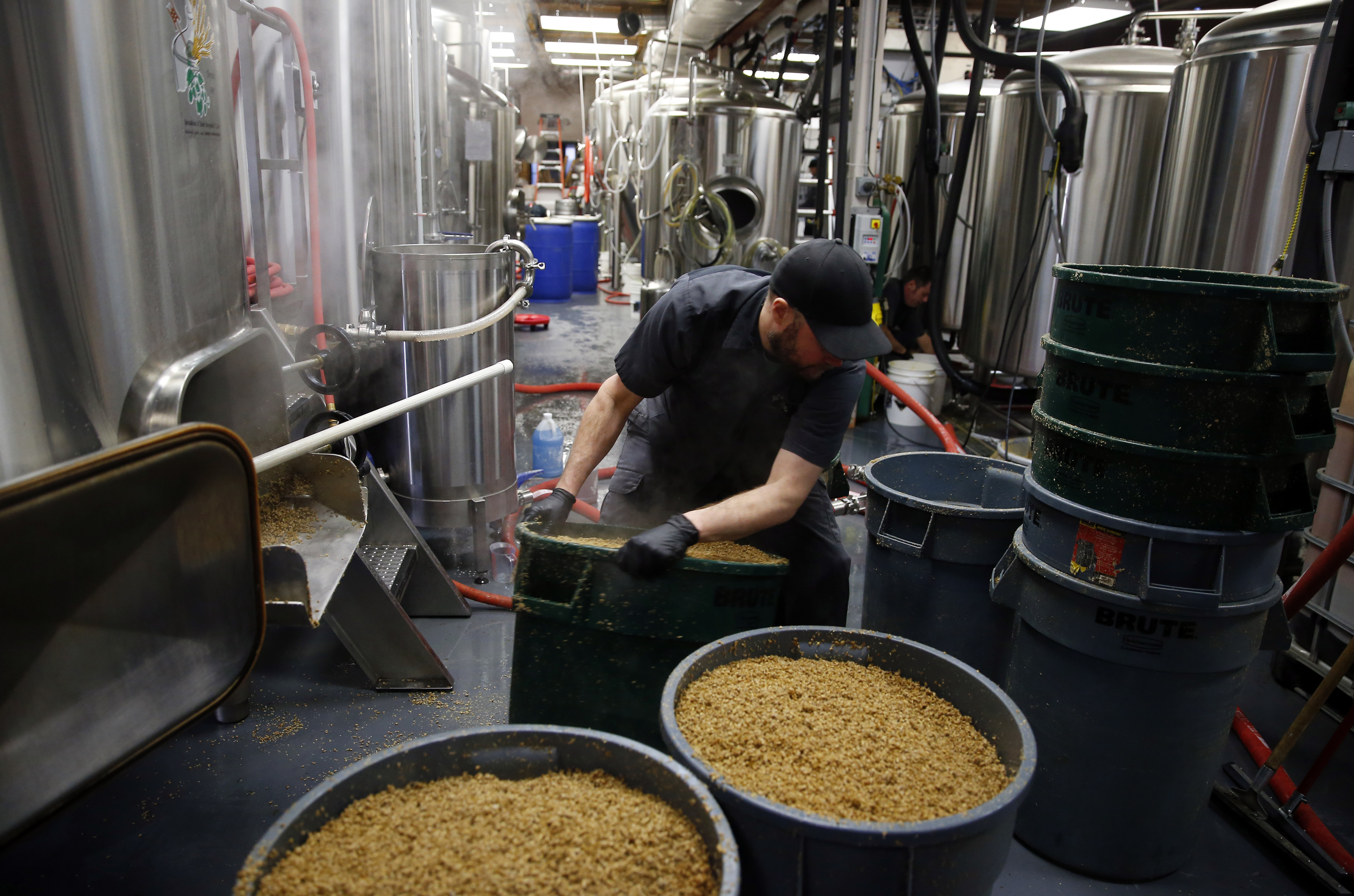 Lead brewer Jim Conroy, 40, of Waterbury, Vt., moved a barrel of mash at the Alchemist brewery, where Heady Topper is made, then sold quickly nearby.