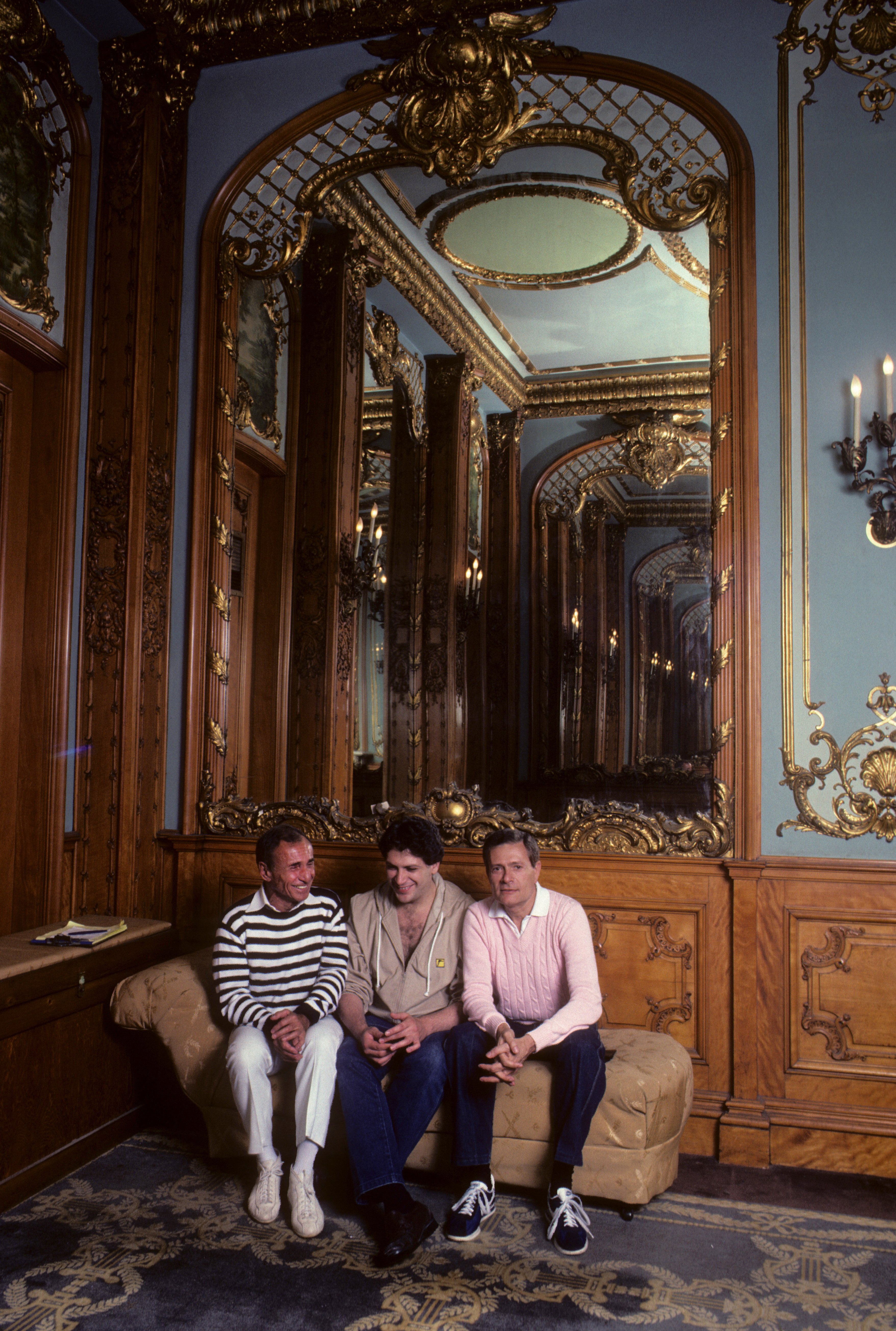 From left to right: Director Arthur Laurents, playwright Harvey Fierstein, and composer Jerry Herman in pink sweater at the Colonial Theater in Boston, Massachusetts for La Cage Aux Folles rehearsals in 1983.