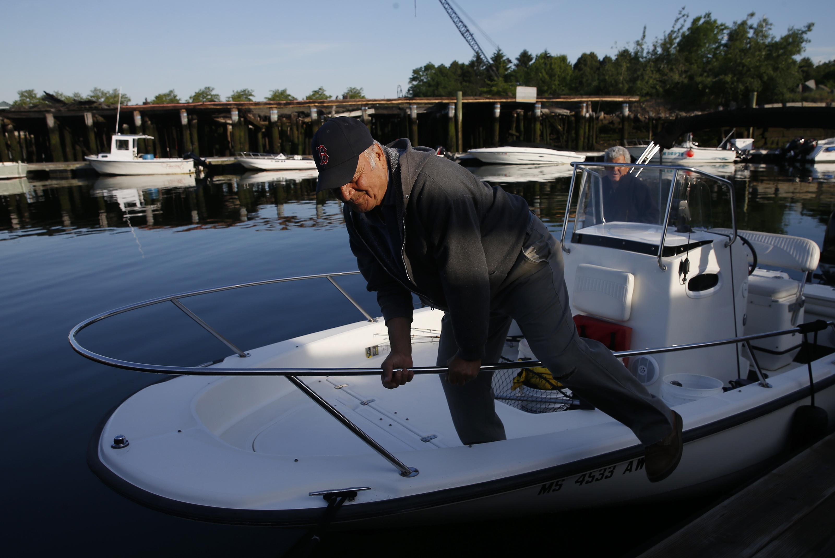Taso Sideropoulos, 76, got into Maury Collins’s boat, which Bob Sideropoulos rented, as they prepared to take off for a day of fishing.